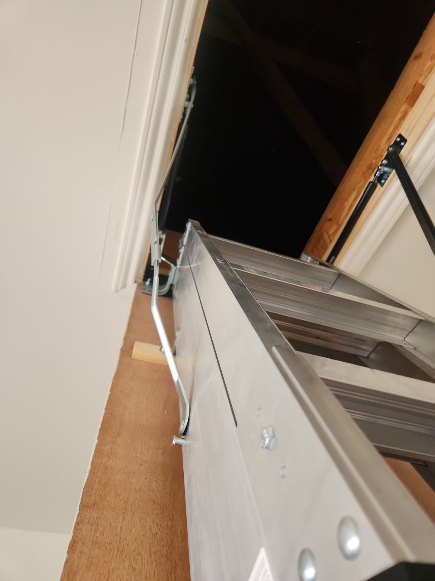 Werner Aluminum Pull-Down Attic Ladder Installation in Stable wood at Slaughter Creek Austin by RejuveNate Renovations LLC