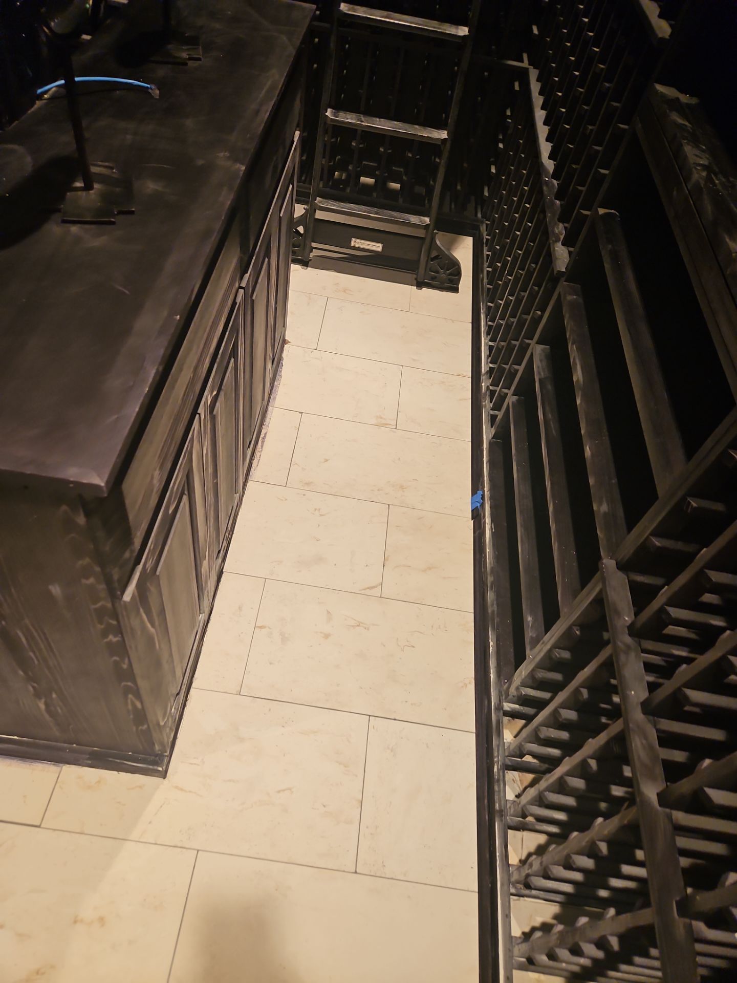 Replaced Stained Wine Cellar Tiles  by Footprints Floors of Nashville