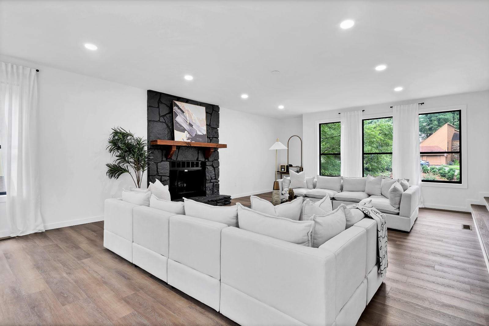 Modern Marietta Home Transformation with Custom Kitchen and Vertical Siding by Swift Home Renovations