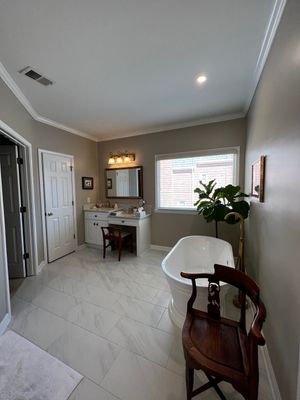 Master Bathroom Renovation with Marble Floor and Freestanding Soaking Tub