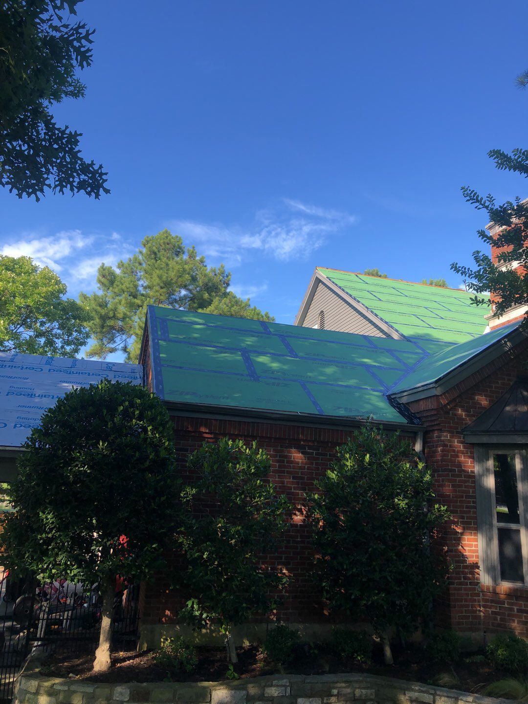 Designer Residential Roof with Zip System by Springtree Restoration