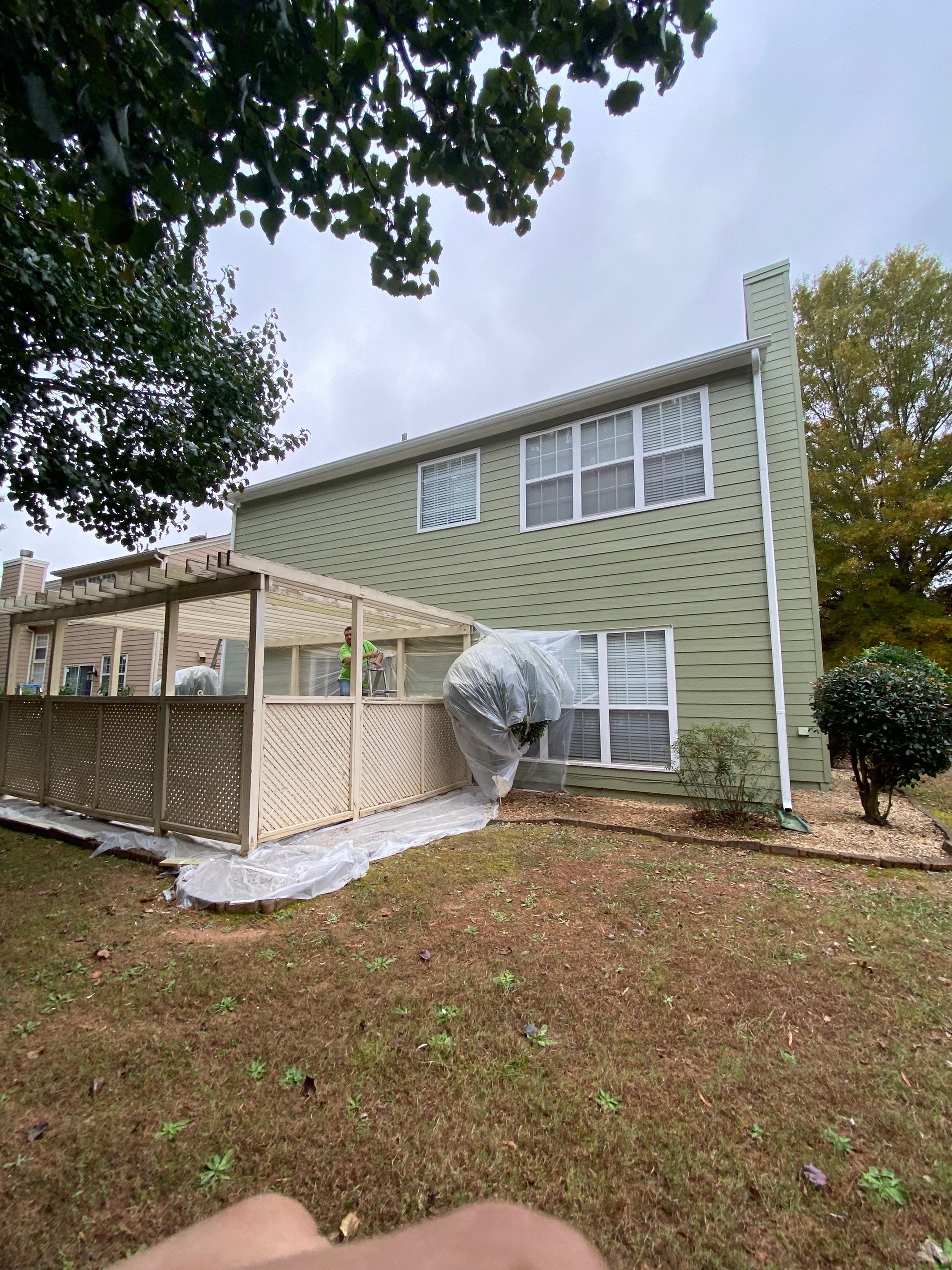Exterior Painting for a Two-Story Sage Green Home in Kennesaw by Swift Home Renovations