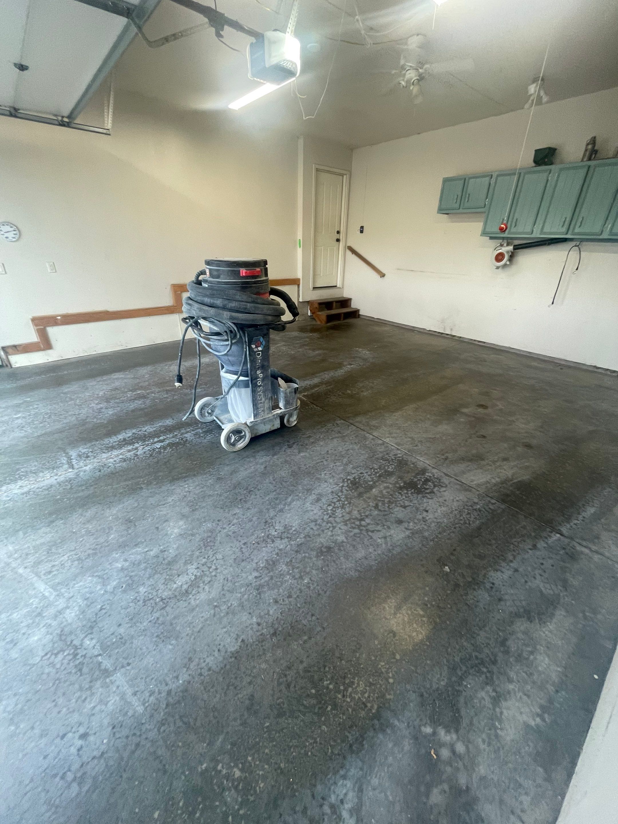Multi-Stall Garage Floor Coating Installation in Sioux Falls by Select Painting, Coatings & Garage Cabinets