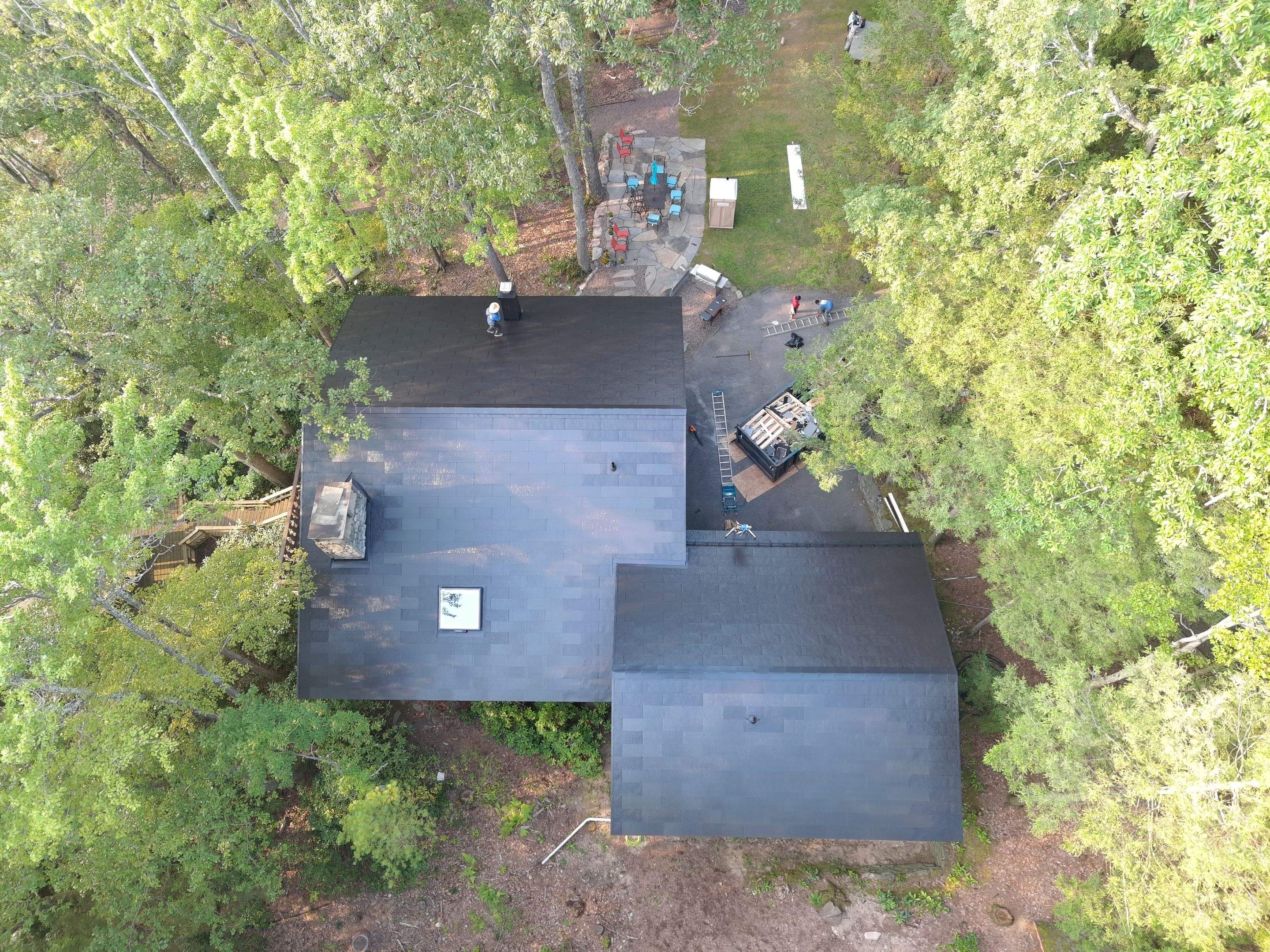 Stunning Tesla Solar Roof Cabin in the Woods by American Home Contractors