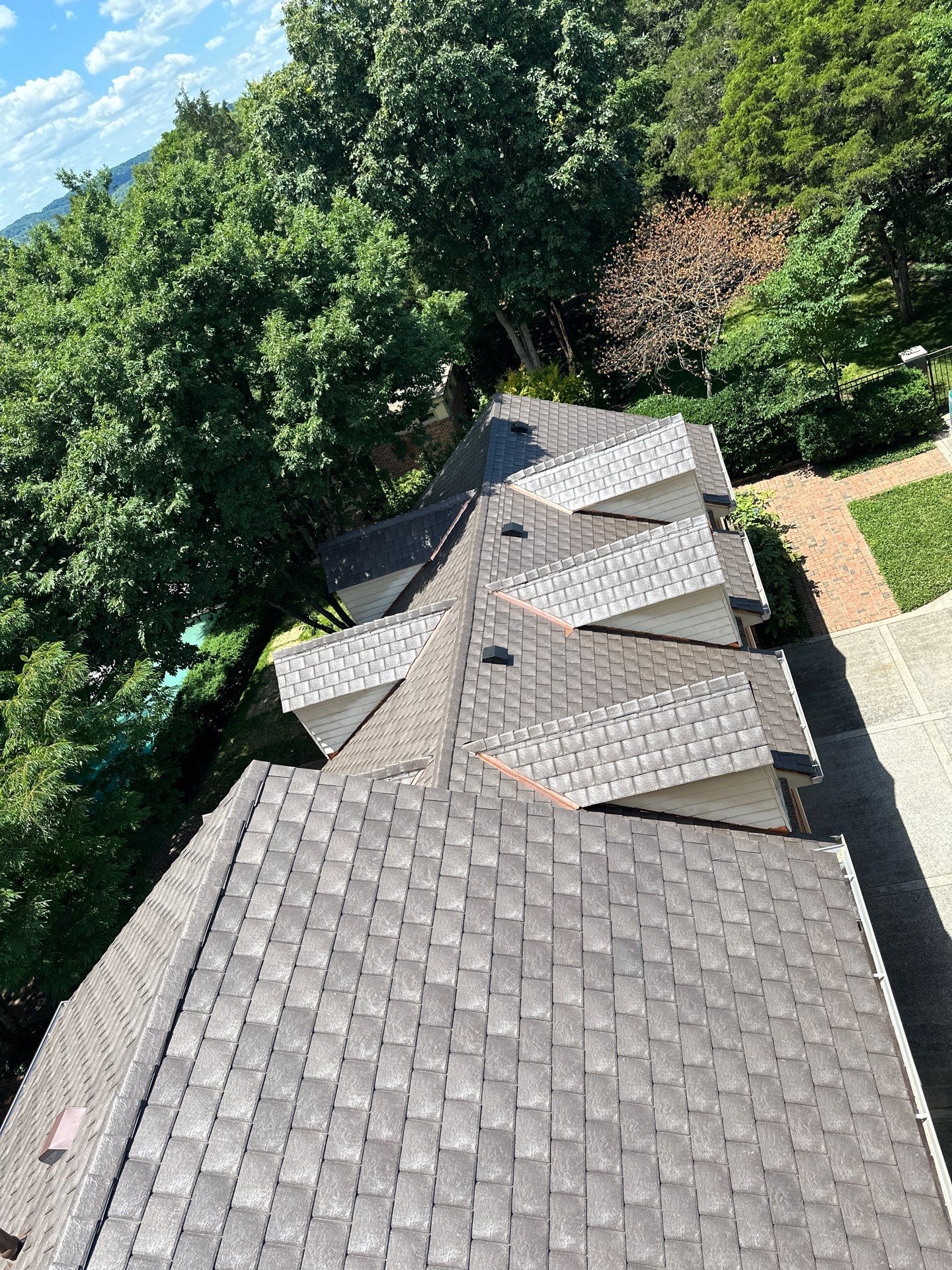 Residential Roofing Installation Using Enviroshake Synthetic Slate by Undersun Roofing 