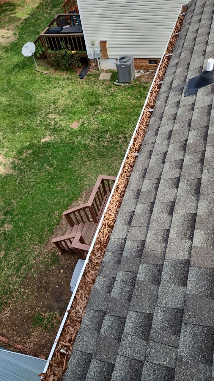 Gutter Cleaning using water by Power Wash Masters LLC