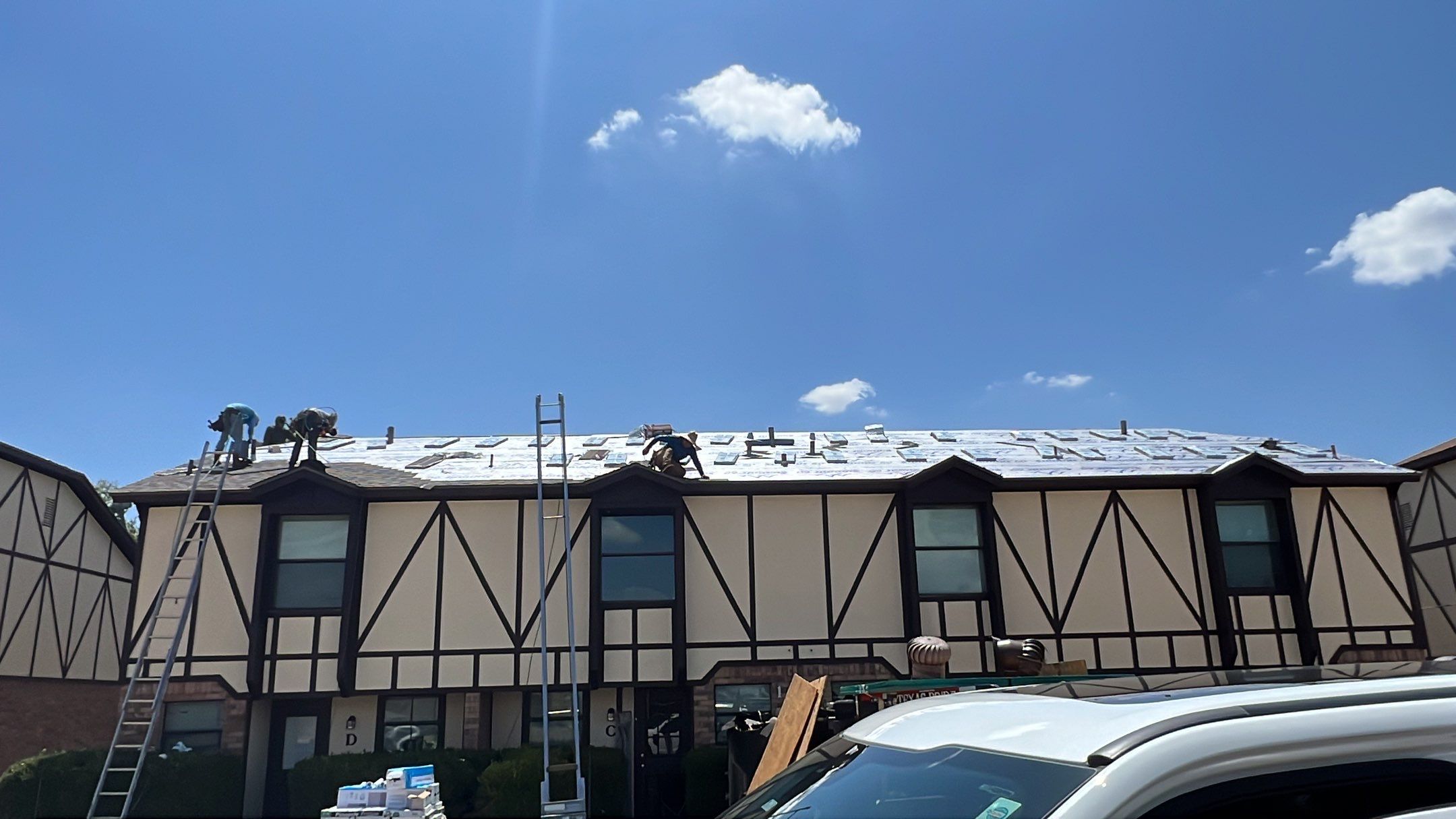 Commercial Roofing Installation using ATLAS Pinnacle Pristine Shingles by Harvey Roofing & Construction