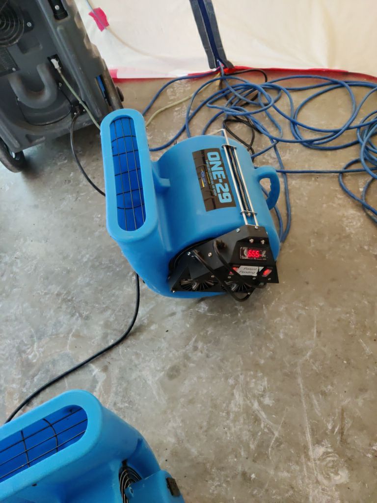 Water Damage in Garage by Accountable Home Services