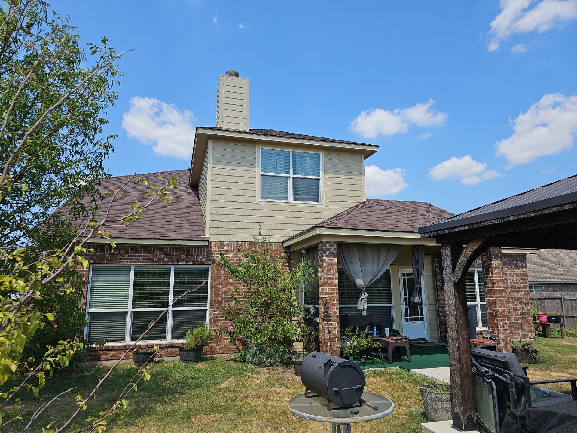 Residential Roofing Installation using Owens Corning Oakridge Brownwood by DeZign Roofing & Exteriors