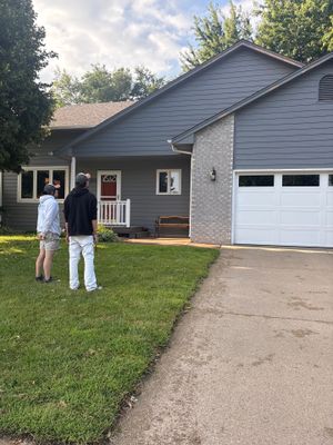 Full Exterior Painting for Gray Siding and Trim in Sioux Falls