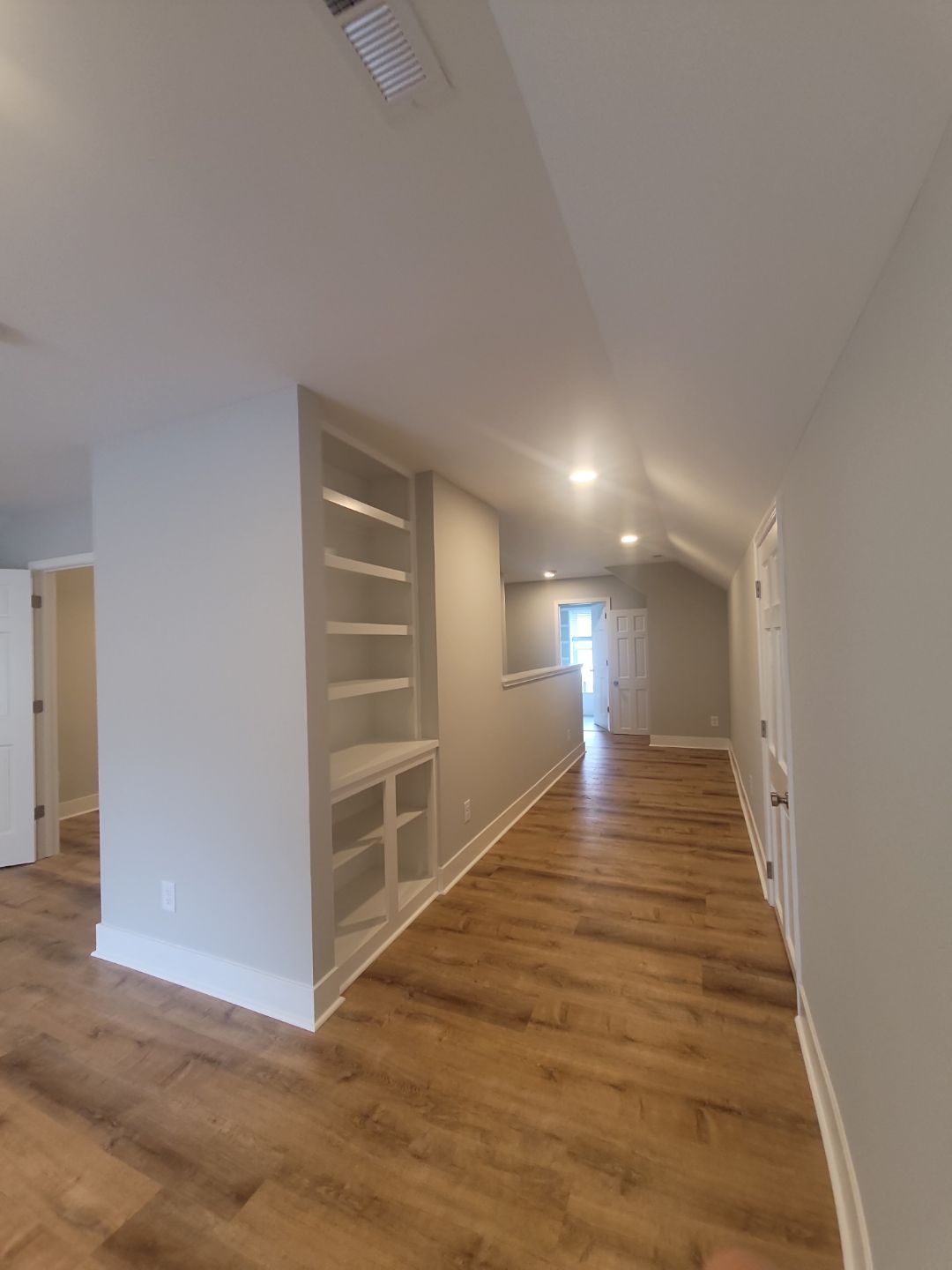 From Rafters to Retreat: An Attic Transformed with a Luxe Bath Escape by Elite Remodeling and Design LLC