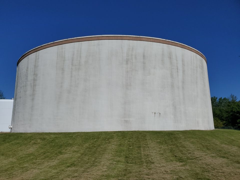 Water tank cleaning by Northern Power Washing LLC.