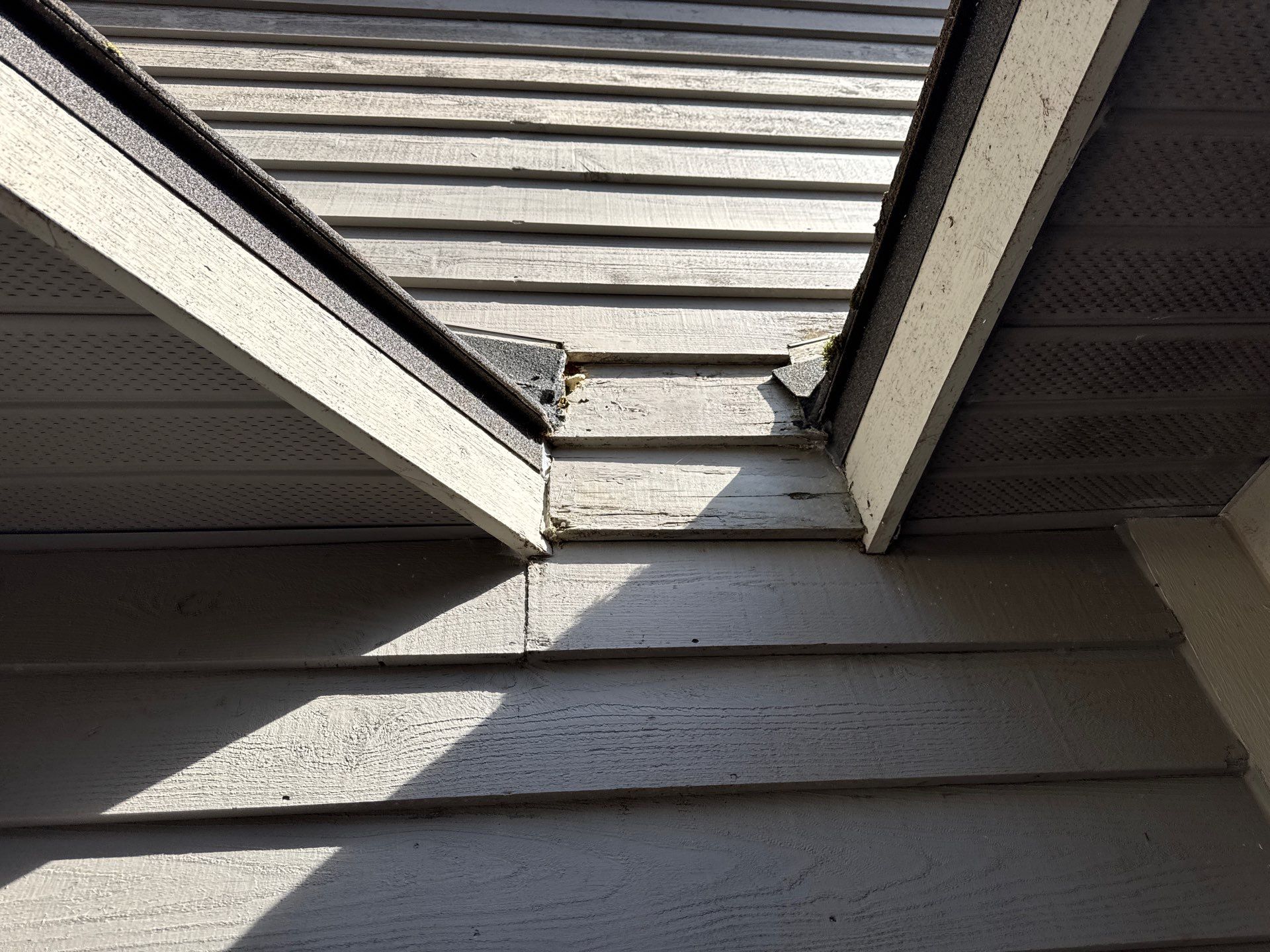 Exterior Siding Repairs and Epoxy Flake Floor in Spring Lake by Gordon Painting