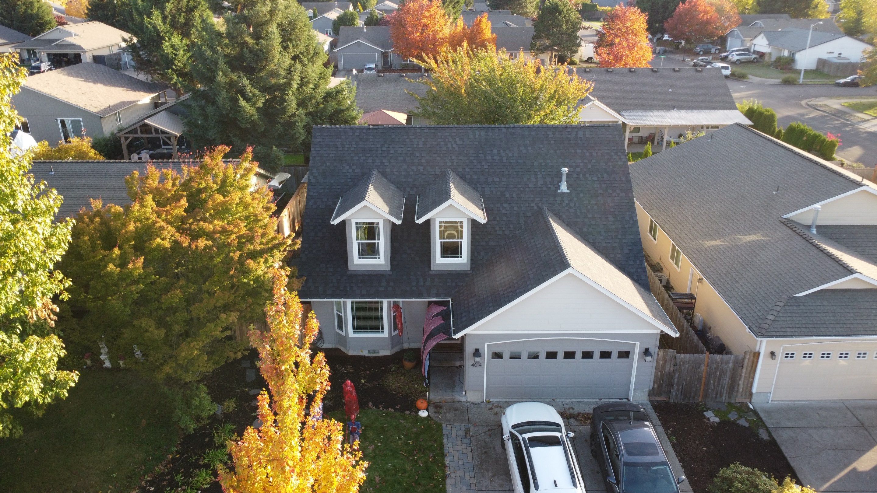 Granite Black Residential Roof Replacement by Orezona Building & Roofing Company, Inc.