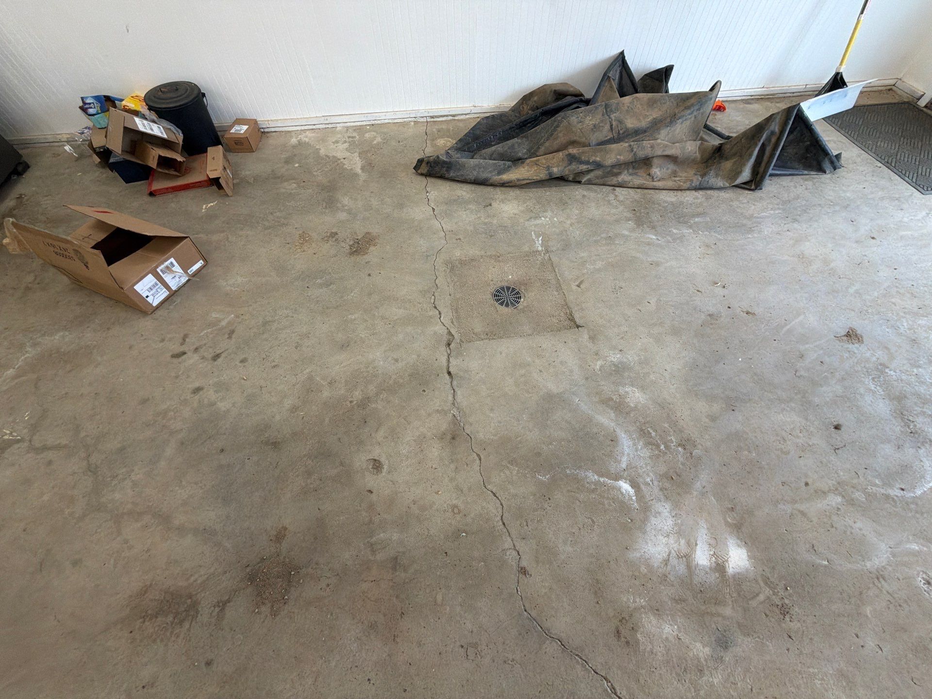 Feather Grey Garage Floor Coating and Crack Repair in Beresford by Select Painting, Coatings & Garage Cabinets