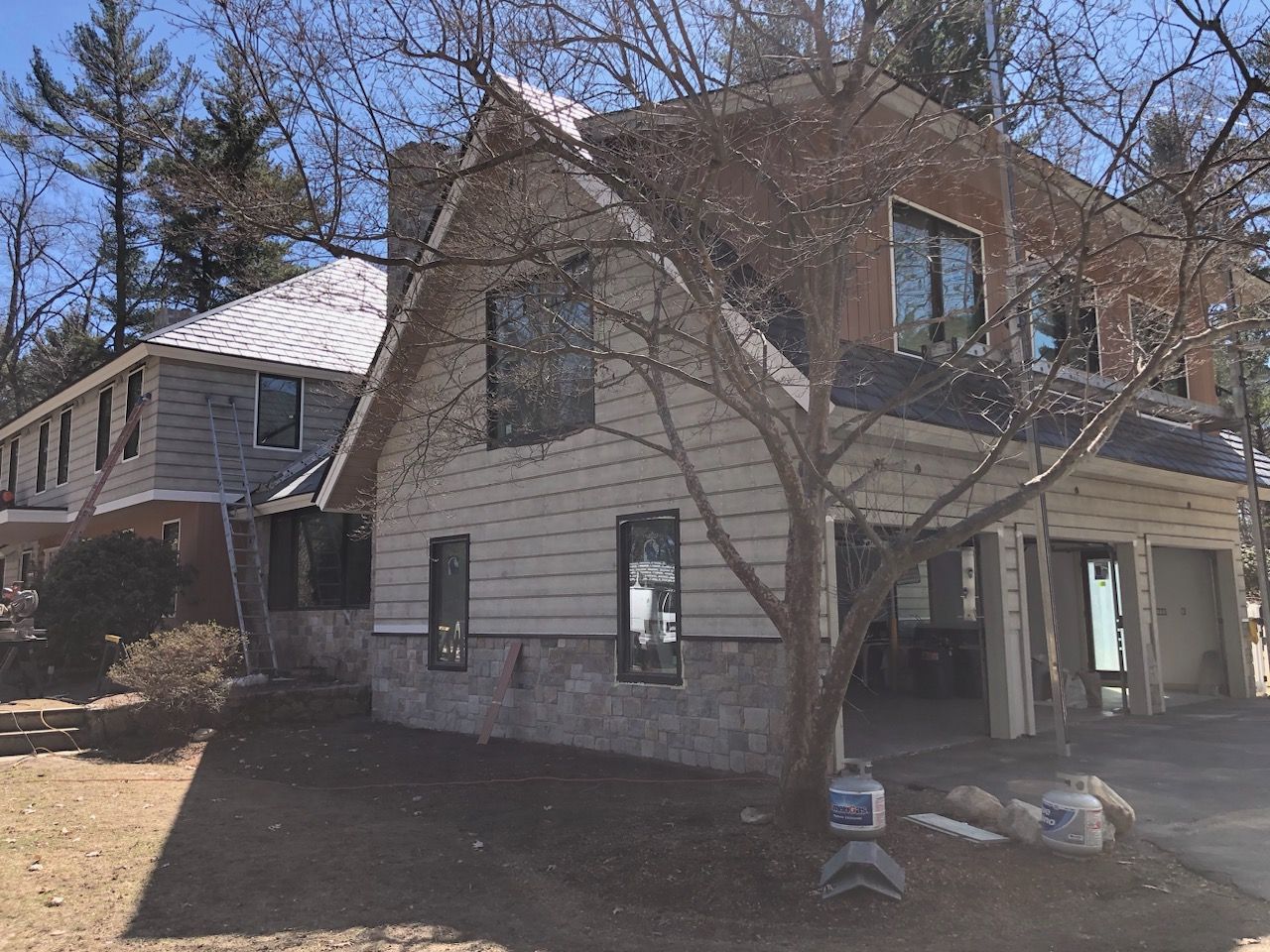 Siding in Weston,  MA by UBrothers Construction
