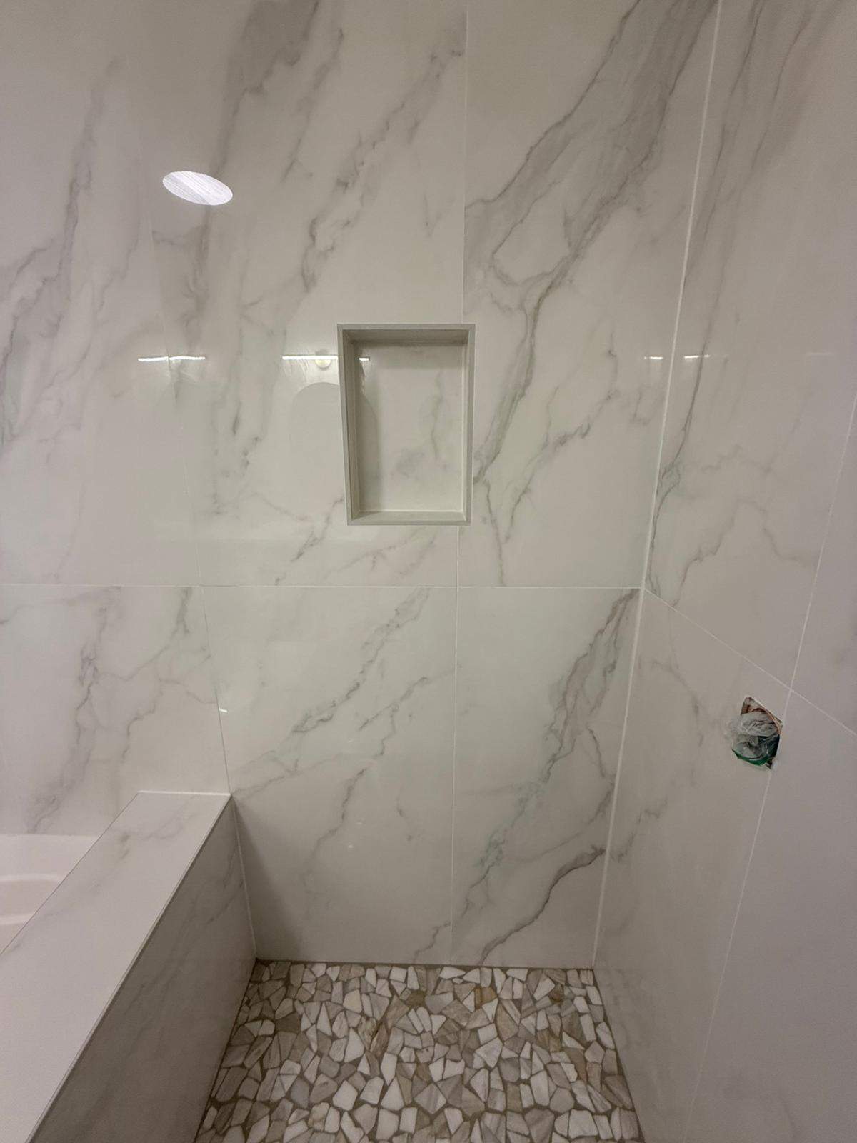 Shower and tub tiling by Prudencio