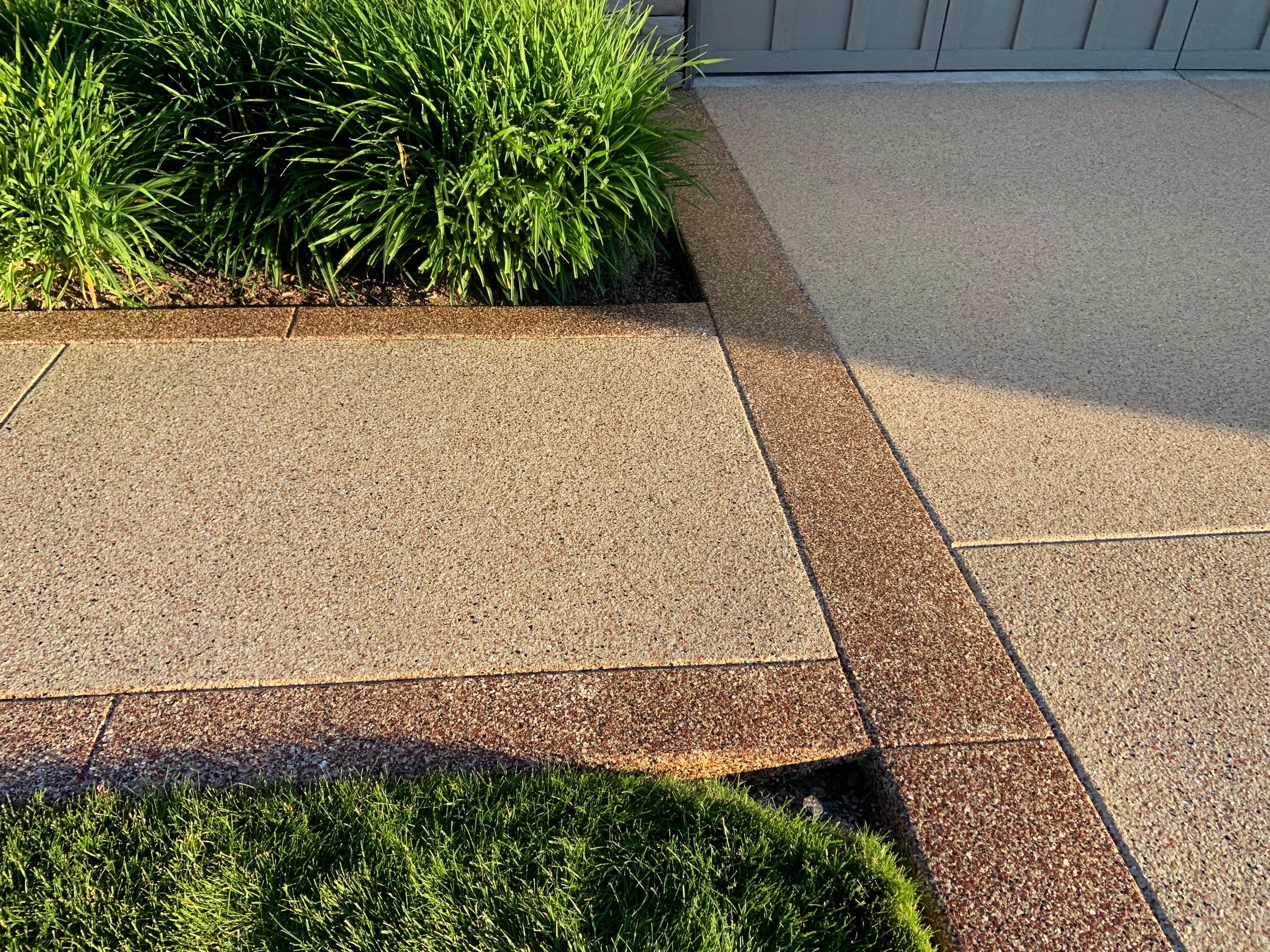 Driveway using Pecan and Chestnut Trim by Croc Coatings, LLC