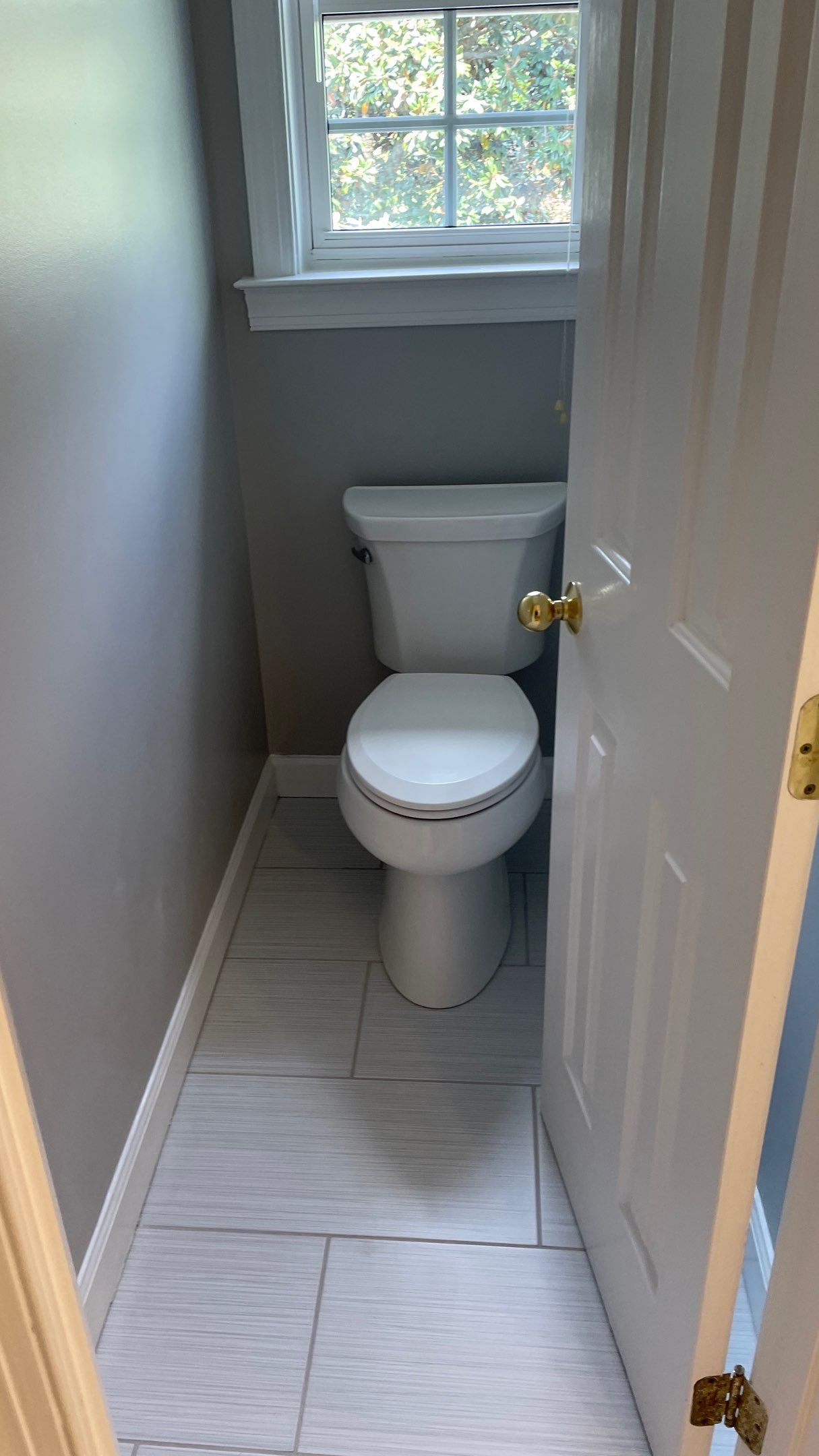 Bathroom Remodel using Schluter by Footprints Floors of Coastal Carolina