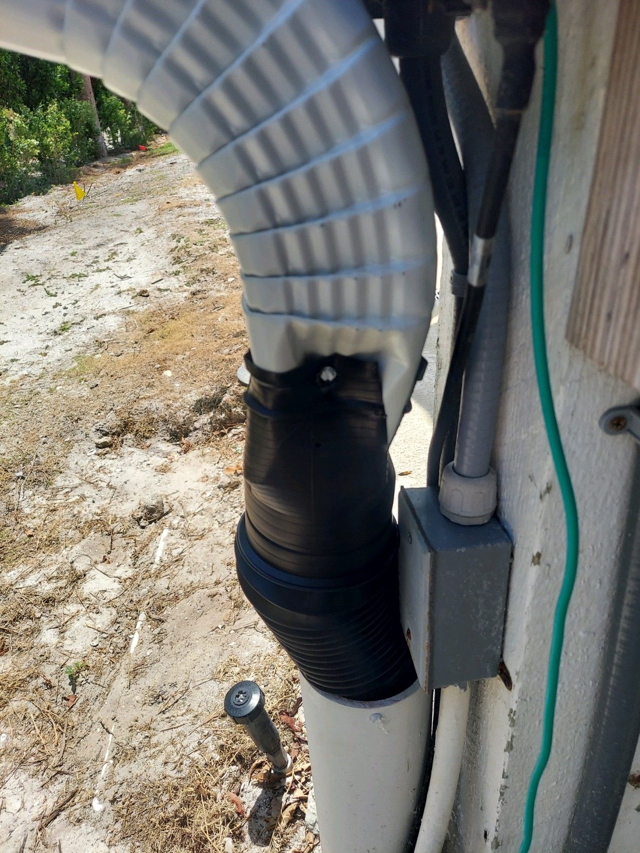 Downspout Installation using Downspout Extension in Sanibel FL by Gutter Professors