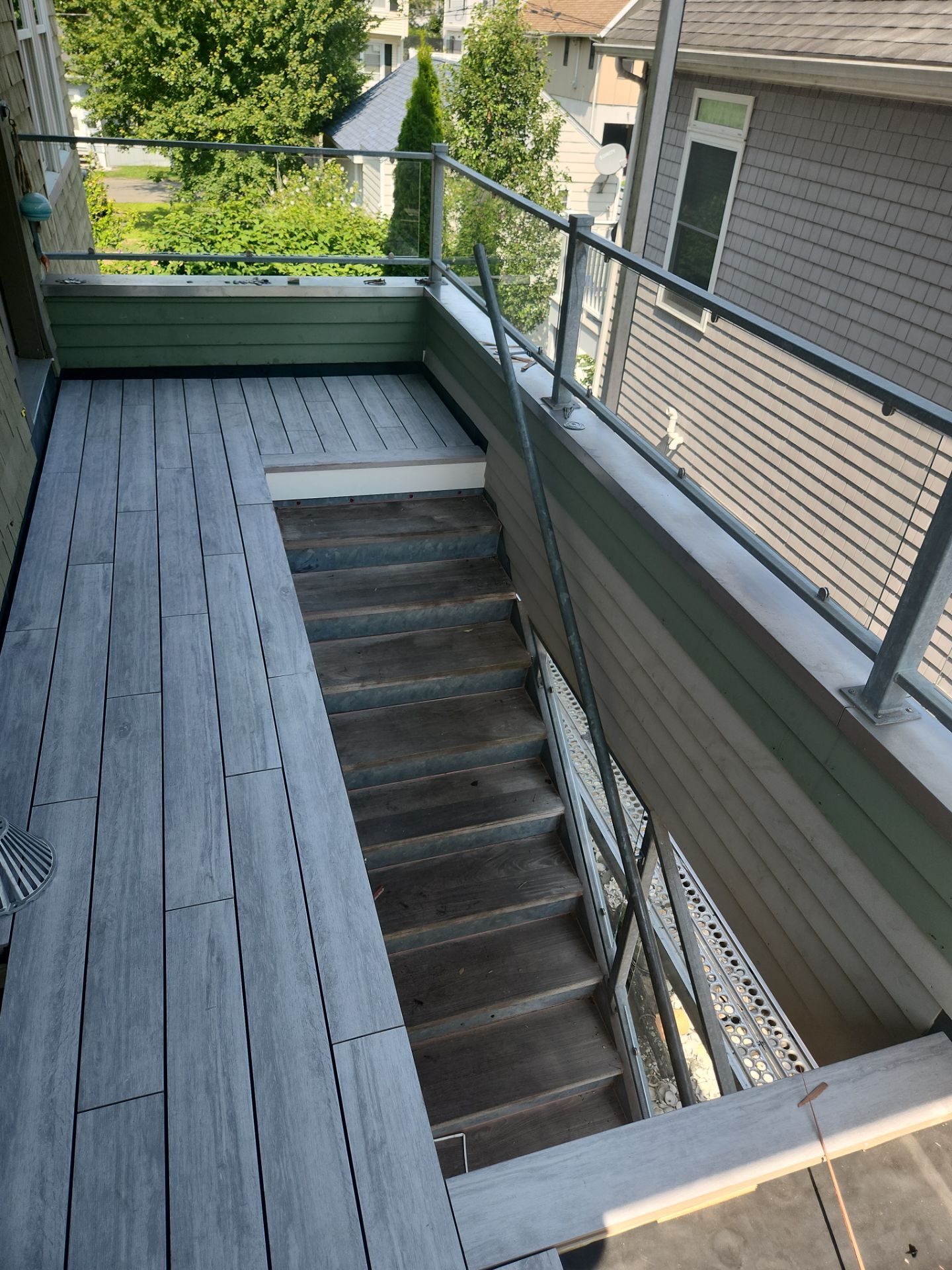 Deck Installation using Tanzite Stone Decking by A Plus Exterior