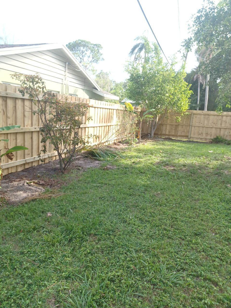 Sarasota, FL 6ft. Tall Treated Board on Board Wood Fence by Asap fence and gates, LLC