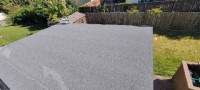 Roof Installation using Asphalt Flat Roofing by ExteriorPros