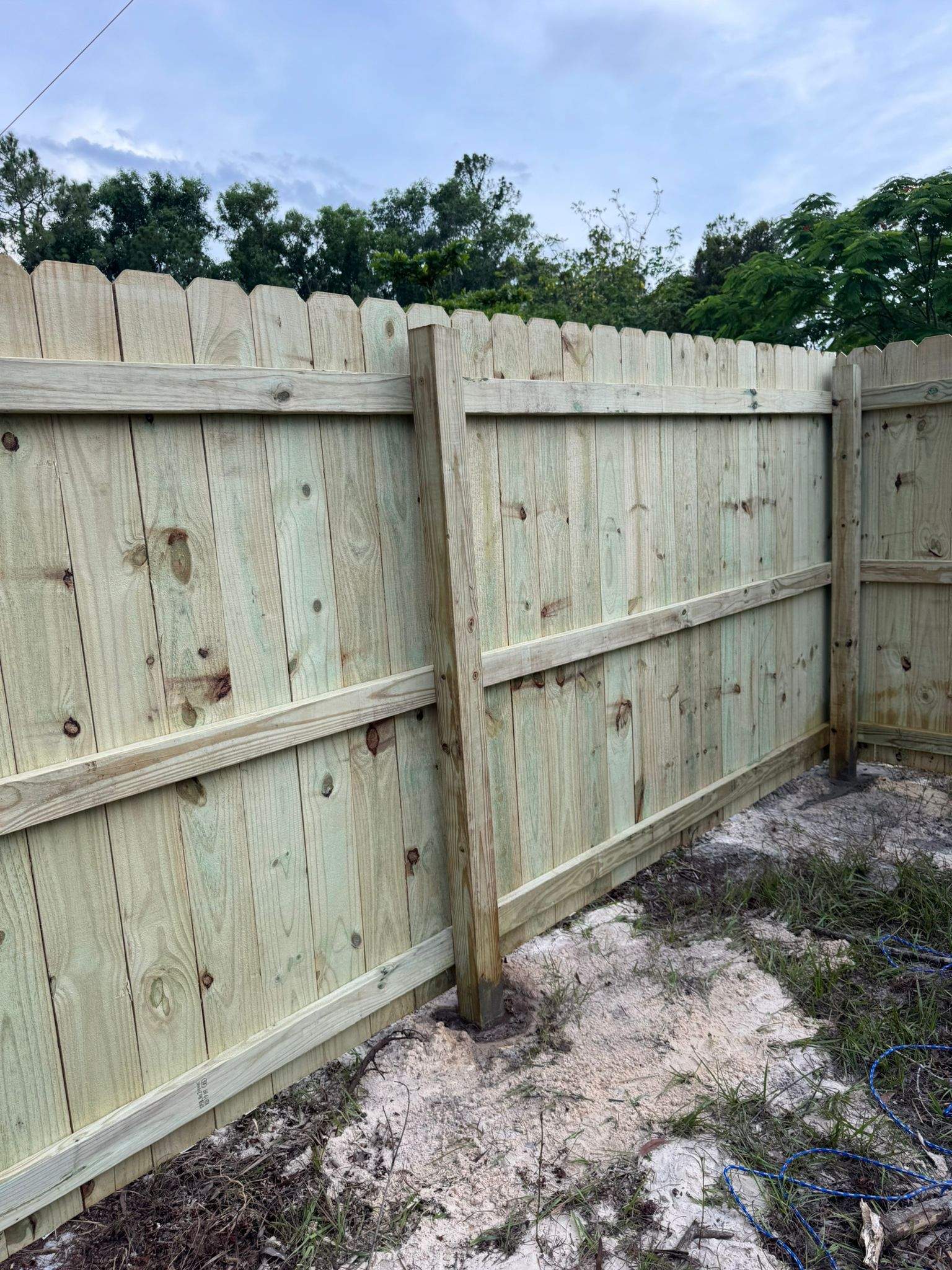 Pressure-Treated Wood Privacy Fence with Dog-Ear Pickets in Lehigh Acres by True Fence LLC
