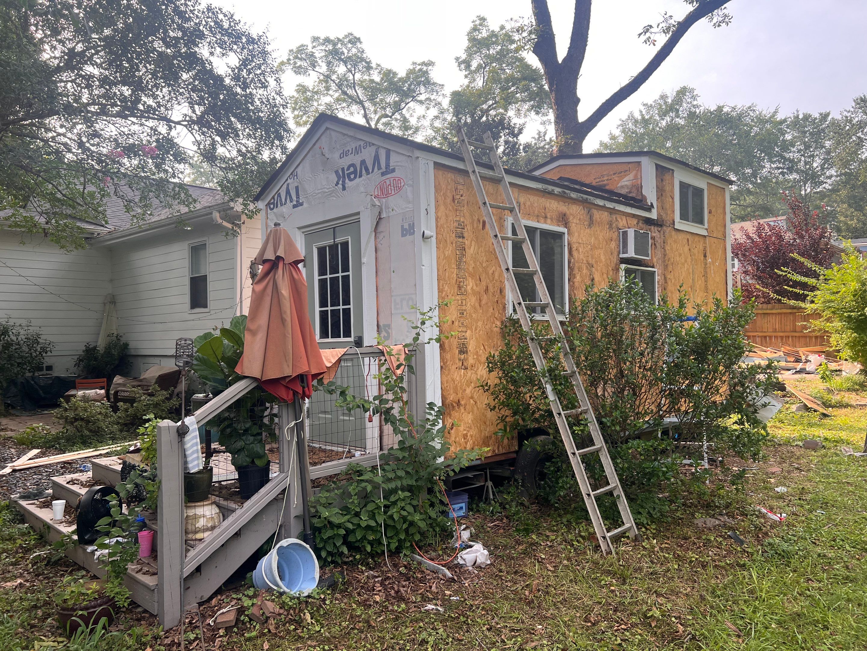 tiny home remodel- siding,paint,roofing by Nailed It Roofing & Remodeling LLC