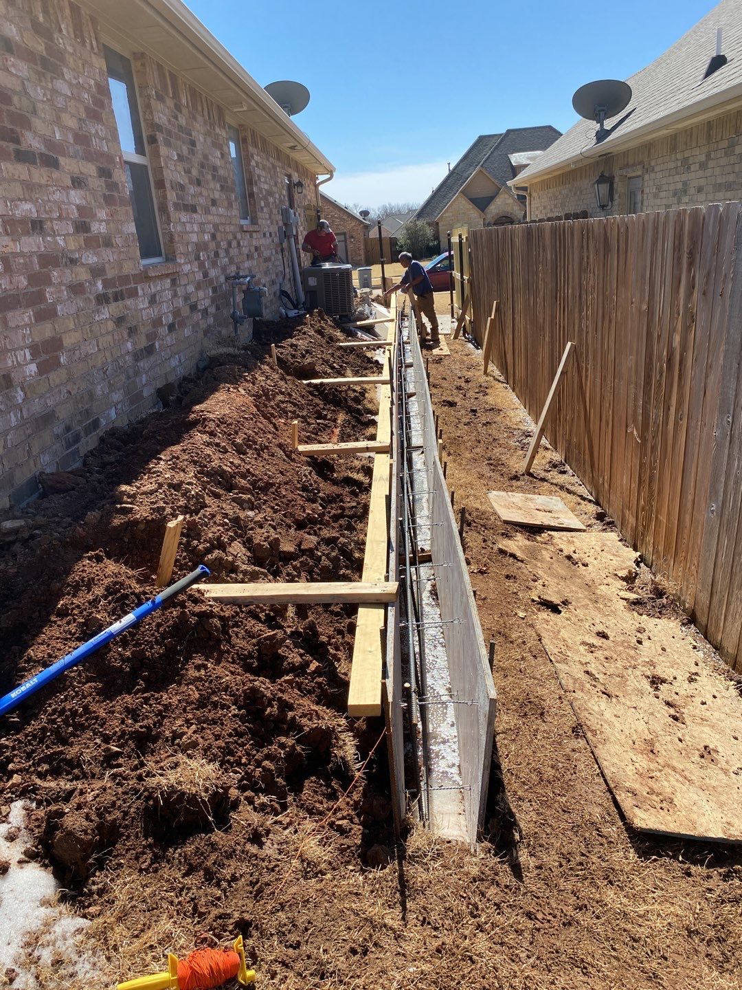 Concrete Slab , Retaining Wall , Fence, and landscape. by Clays Services Inc