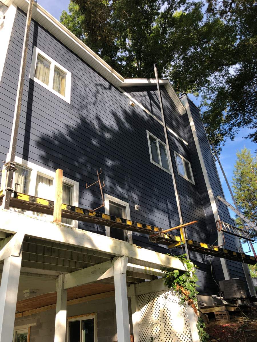 Siding Installation using JH Batten Smooth and JH Cedar Mill Plank by ExteriorPros