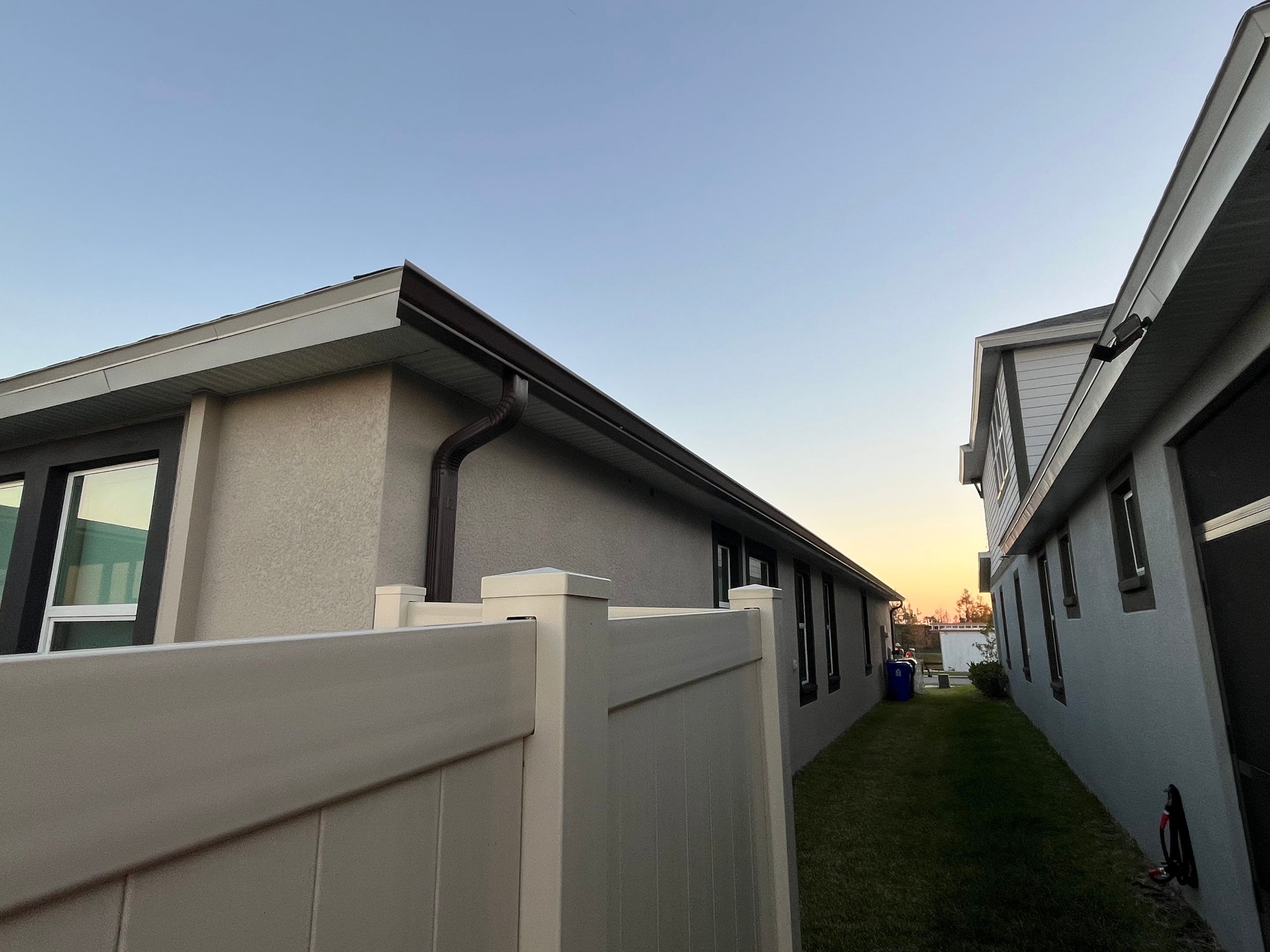 3X4 elbow Downspouts using Musket Brown Seamless Gutters in Lakeland FL by Gutter Professors
