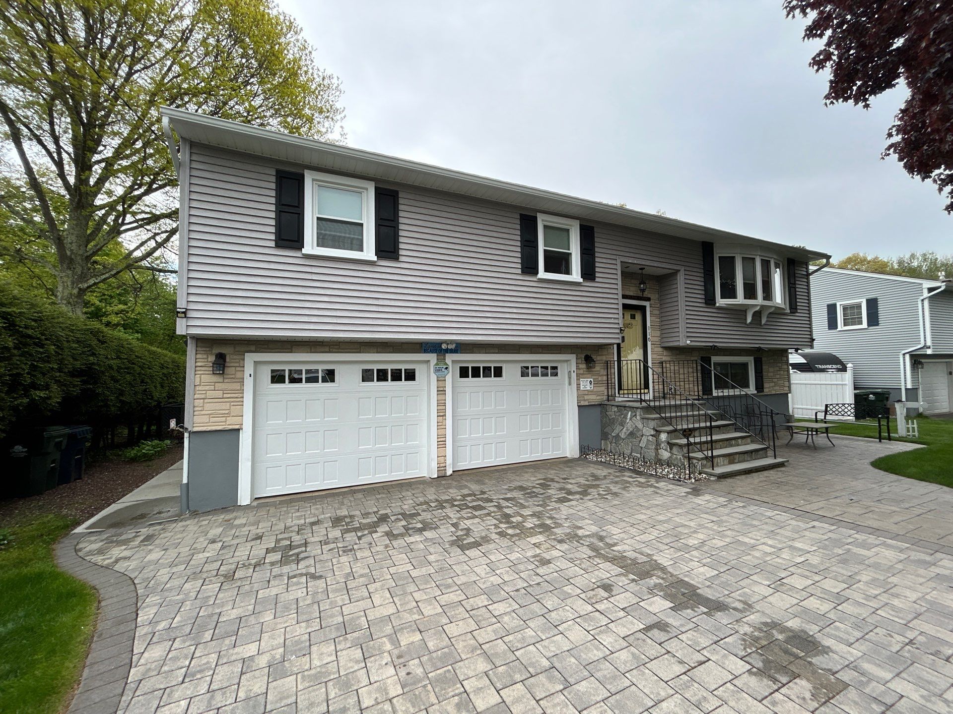 Garage Door Installation using Amarr Designer Choice door by DiGiorgi Roofing and Siding Inc