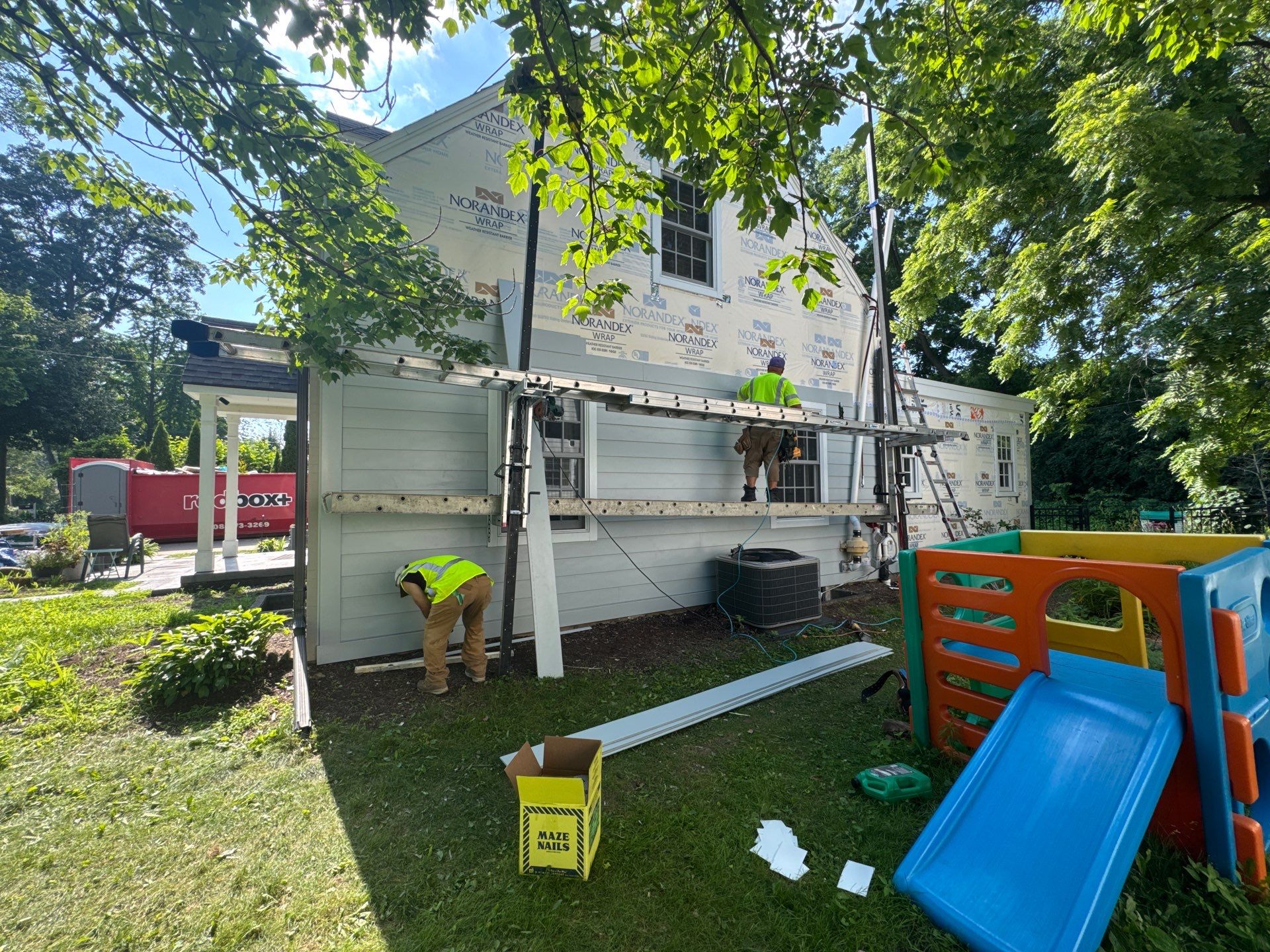 C.M.: Roof and siding by AFC Exteriors