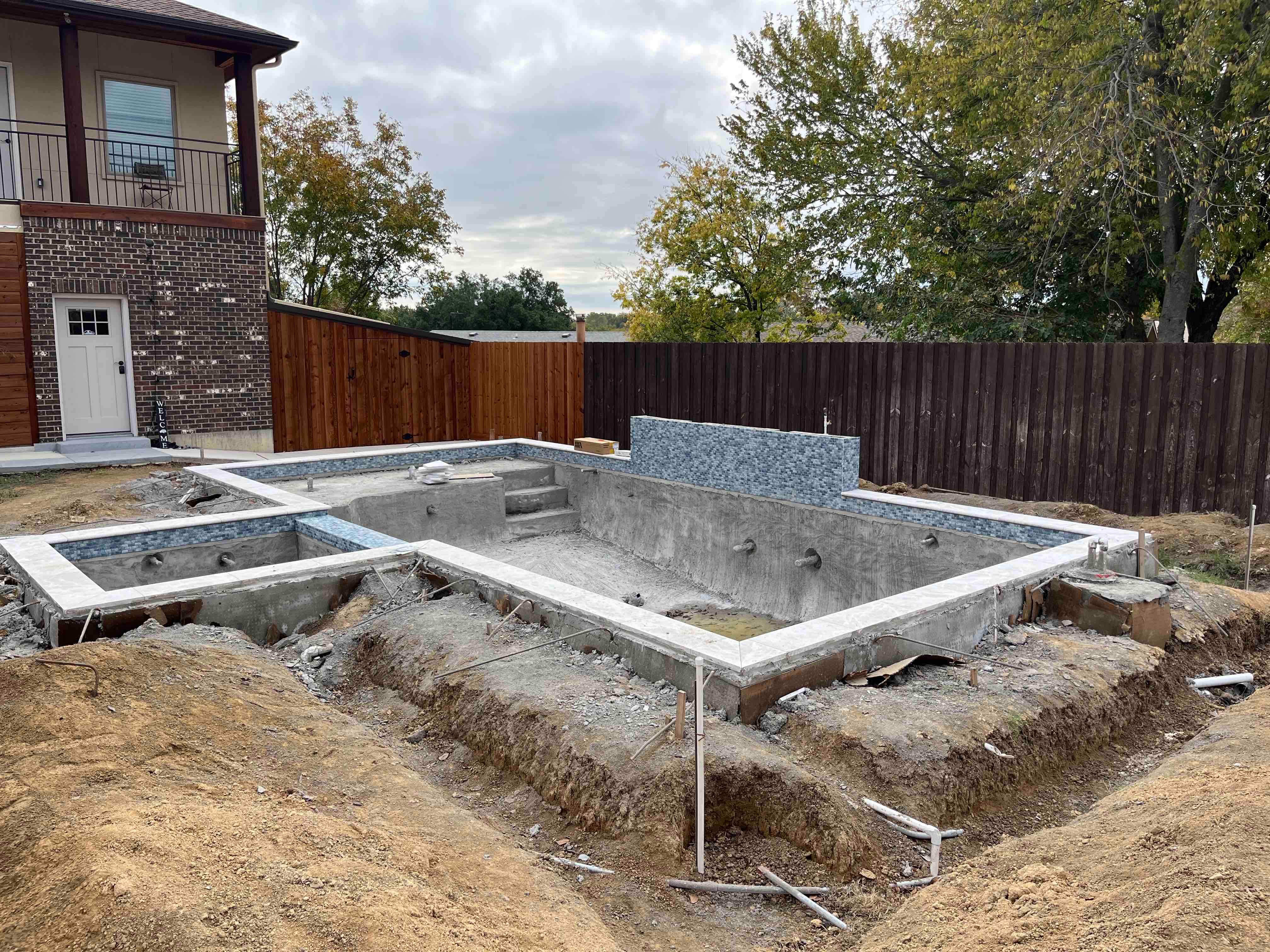 Geometric Pool with Raised Spa and Stone Coping by Pinnacle Pools and Spas - DFW