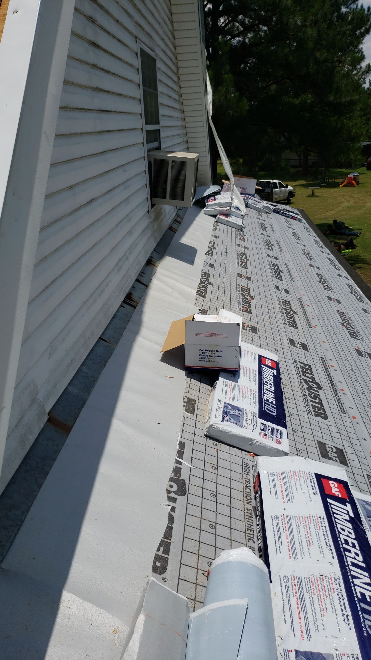 Residential Roofing Installation using Roof Replacement by American Roofing & Construction LLC