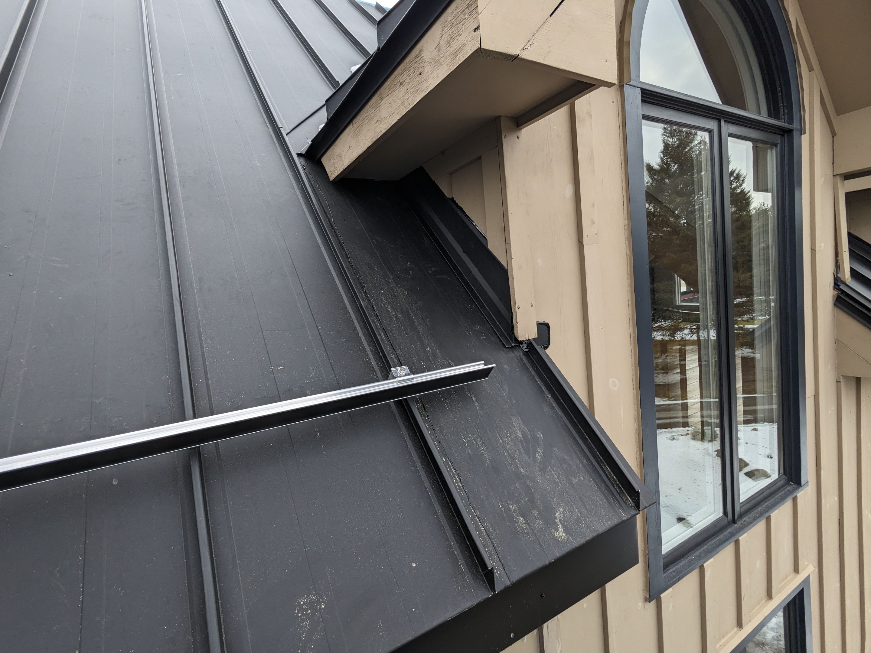 Residential Roofing Installation using 24 Ga Standing Seam Metal by Jay Carter Roofing & Sheet Metal