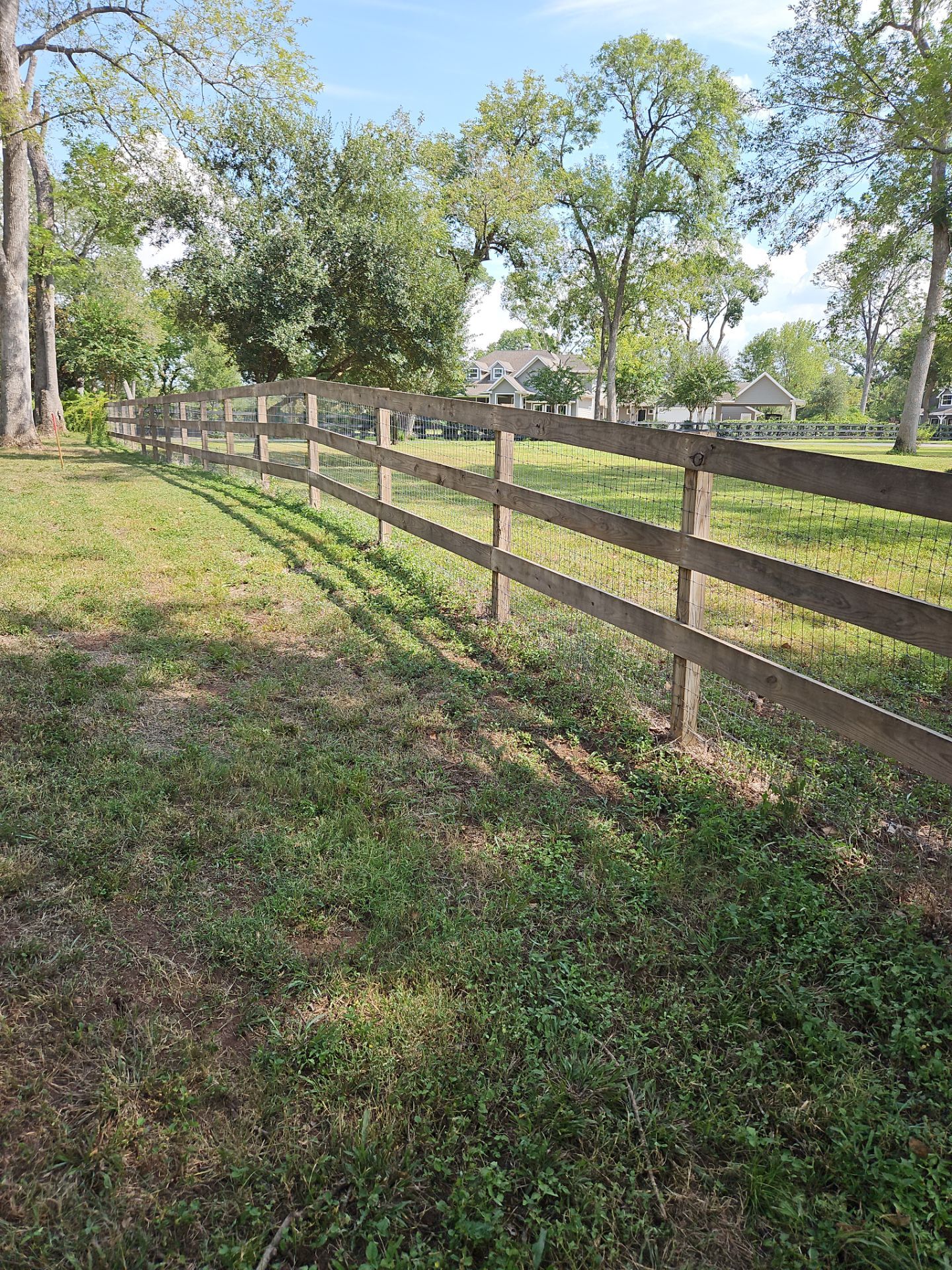 Ranch Style fence Plus Iron installation by Tim's Fences