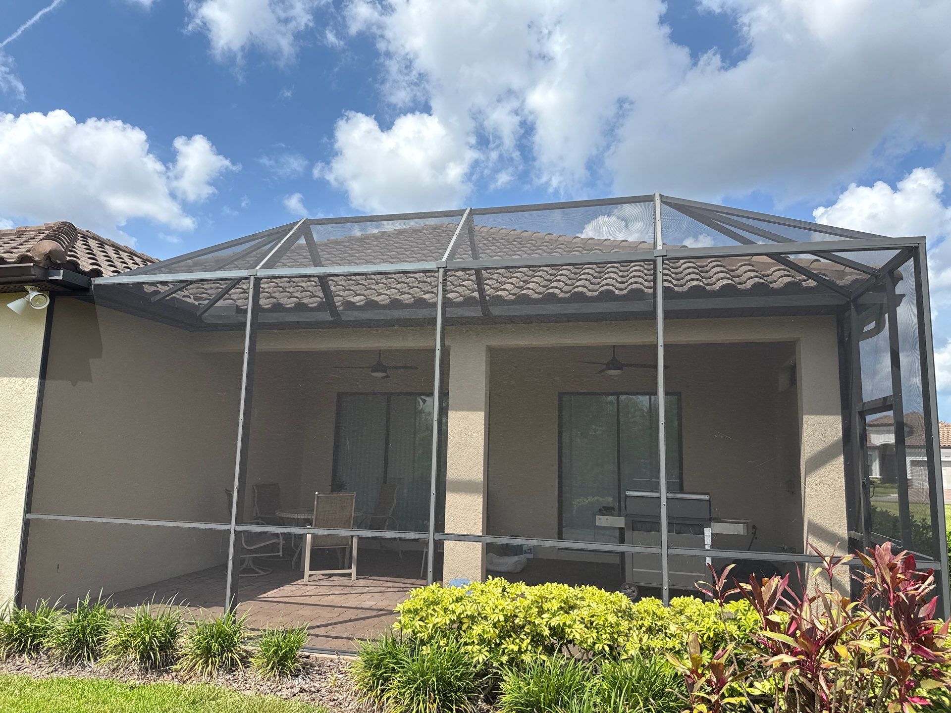 Concrete Tile Roof, Paver Driveway & Lanai Cleaning – Artisan Lakes Esplanade, Palmetto, FL by Sunshine AquaWash