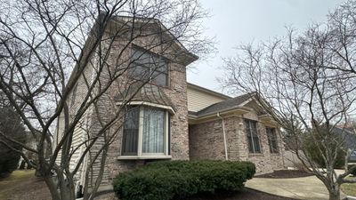 Turtle Shell gutter protection installation in Wheaton, IL 60189, photograph 2