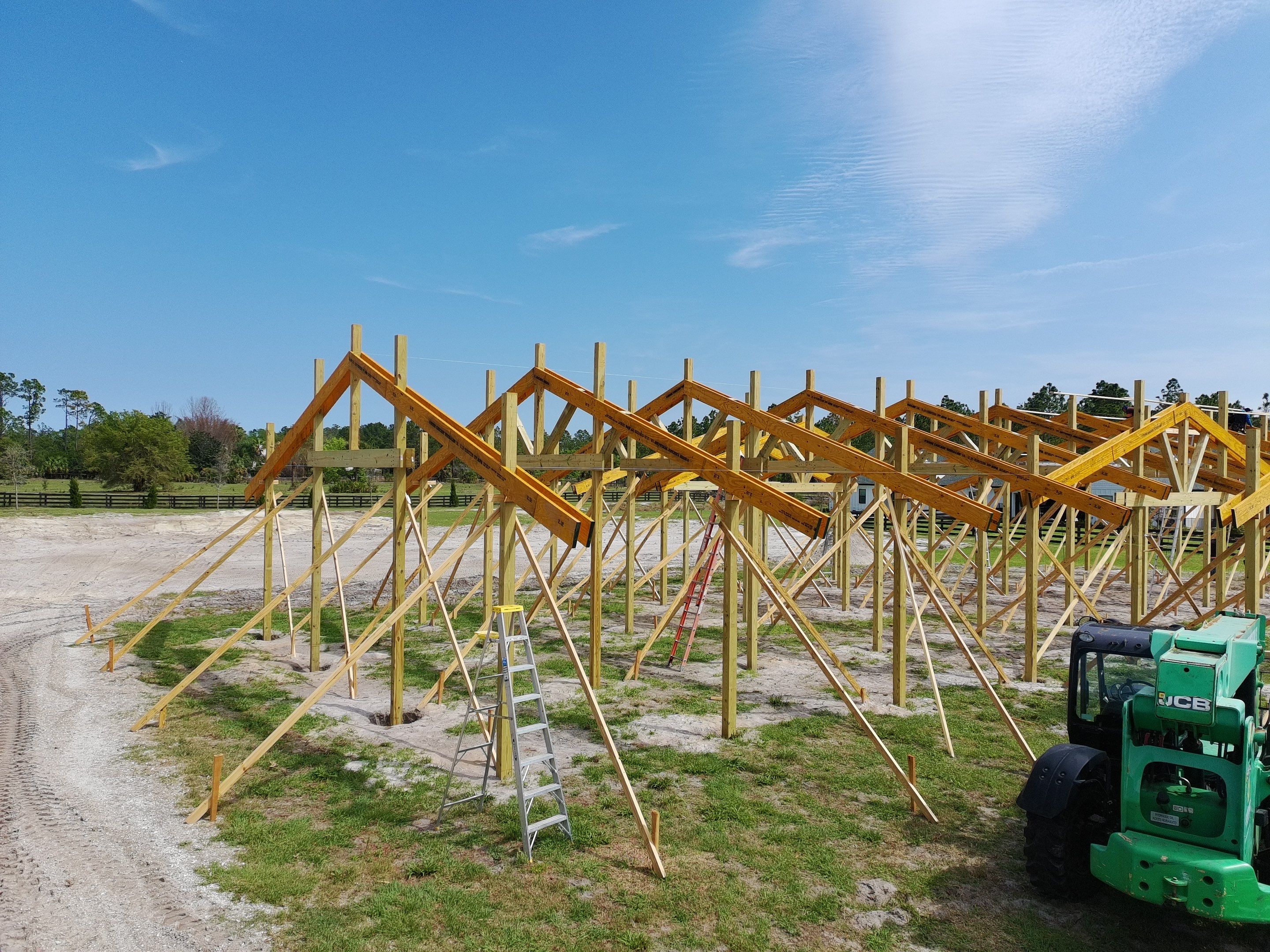 Custom Post-Frame Horse Barn and Shingle Roof Installation in Geneva by Fortified Roofing Solutions Corp.