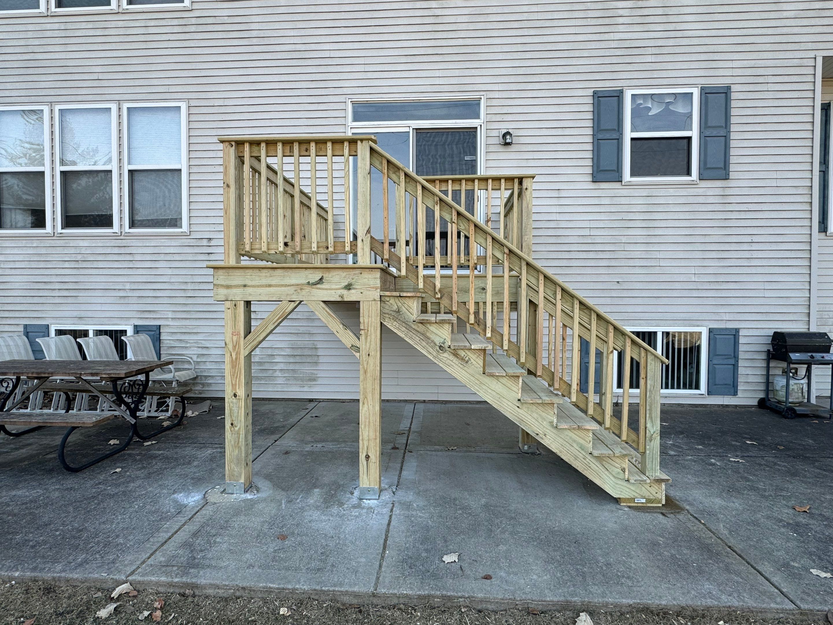 Deck Resurface with Treated SYP by Two Brothers Residential Maintenance