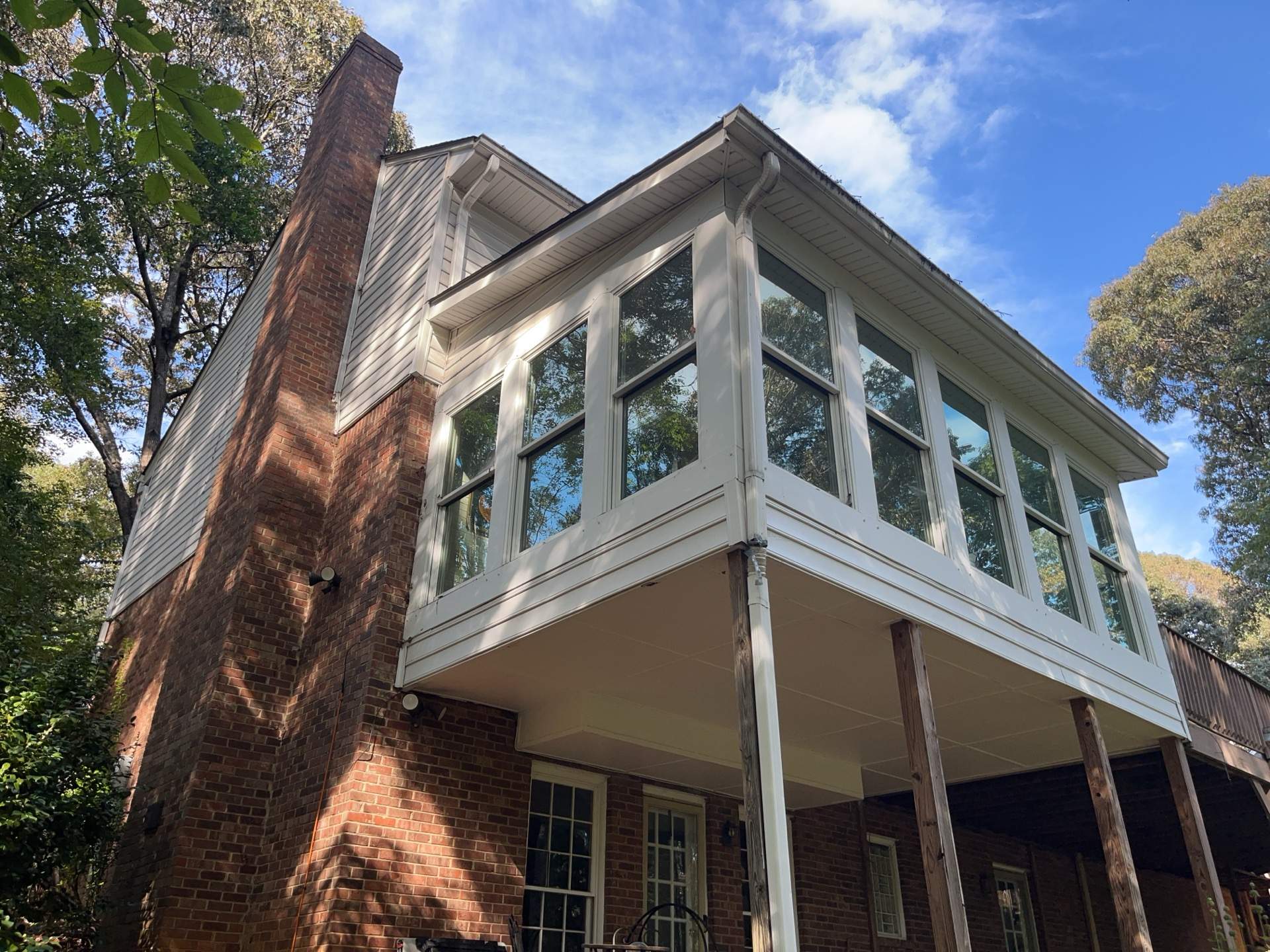 Deck Build and Screened-In Porch Install with Wild Hog 6' Black Mesh Panel Railing by Nelson Exteriors 