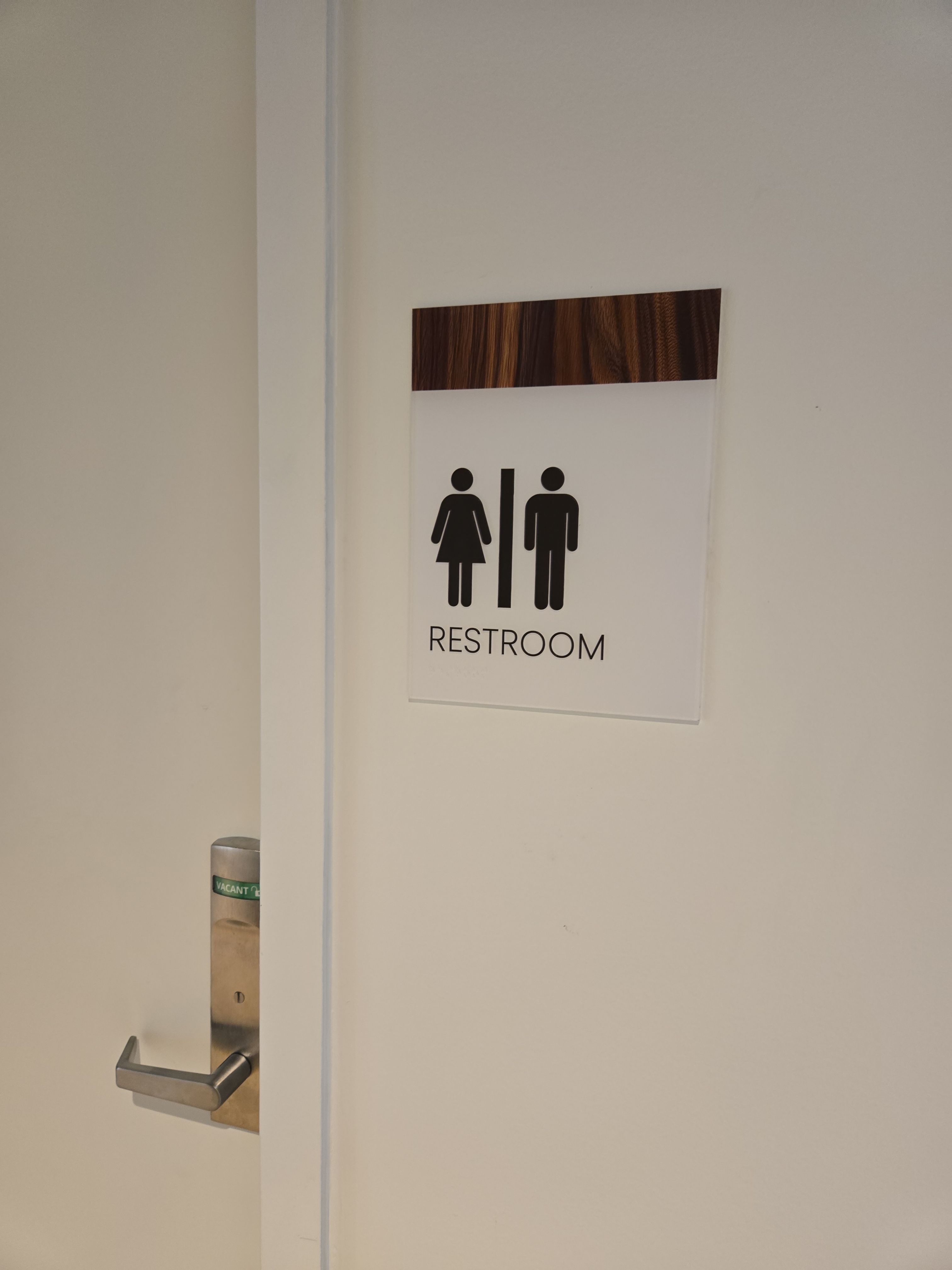 Interior ADA Restroom Signage with Wood Grain Accents by Hayes Design co
