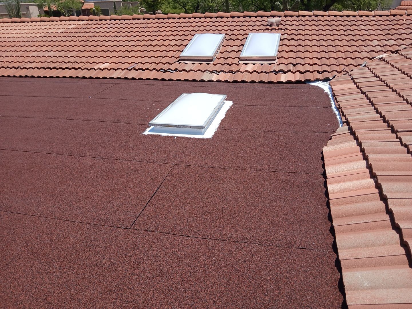 Residential Tile Roof Restoration and Low Slope Membrane Replacement in Tucson by West Coast Roofing AZ