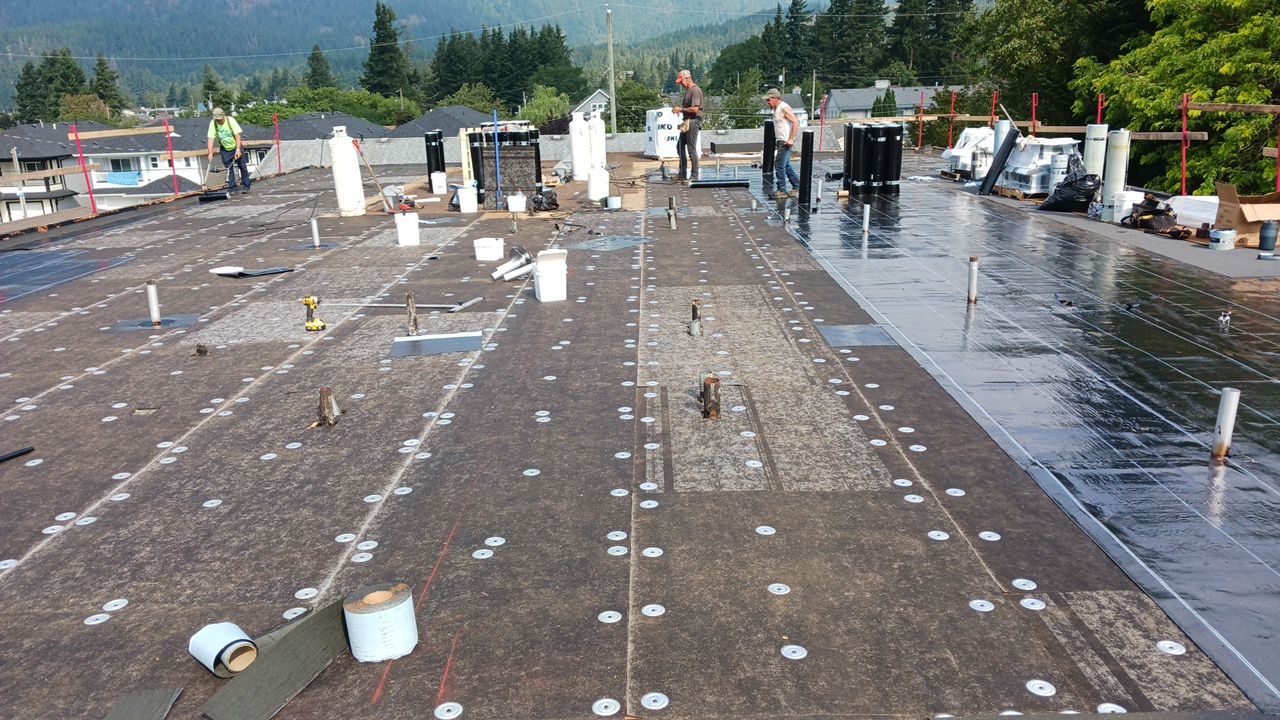 Residential ReRoofing Installation using IKO 2ply sbs  by Top Notch Roofing Inc