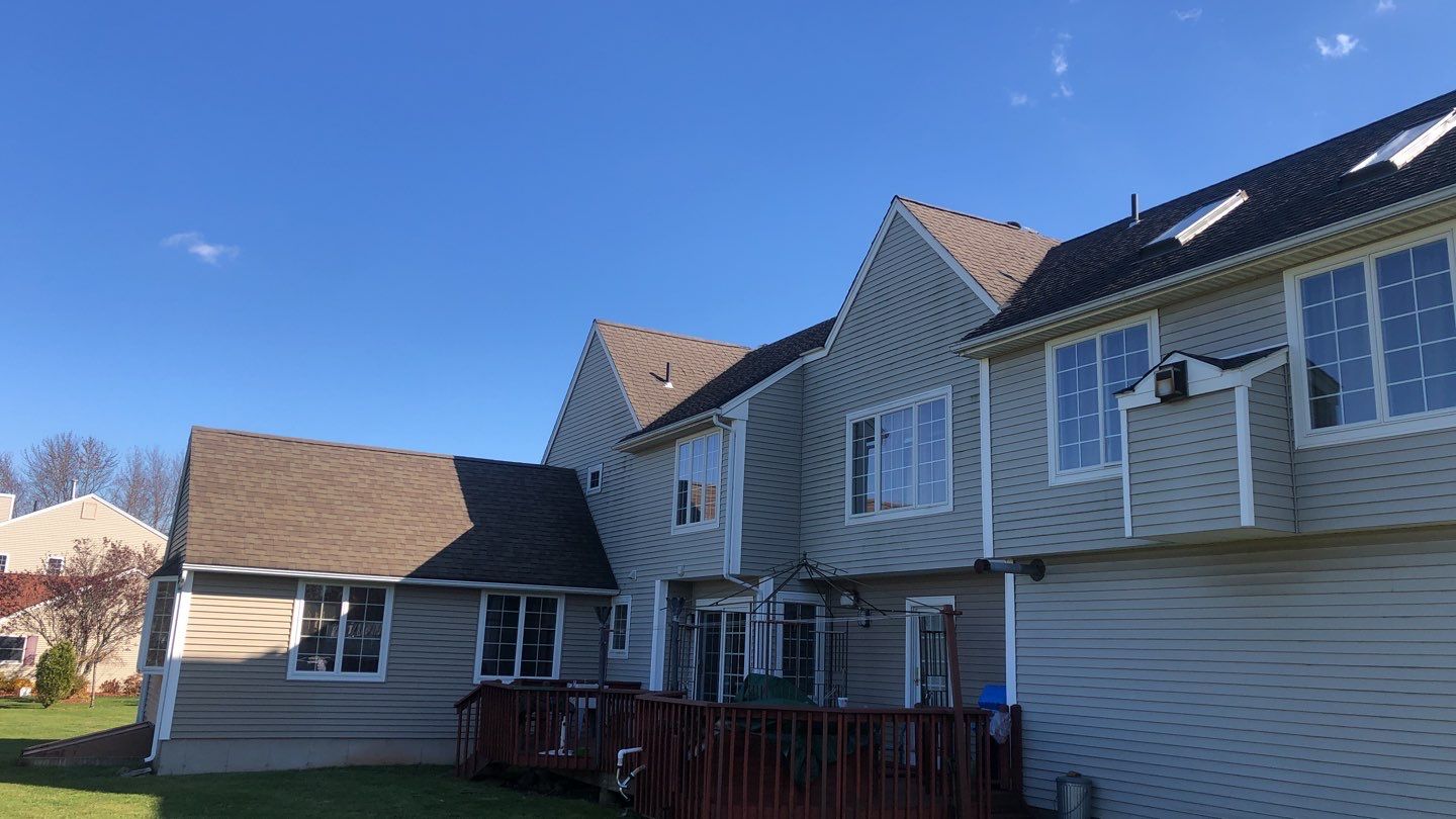 Commercial Roofing Installation using Owens Corning TruDefinition driftwood by A Plus Exterior