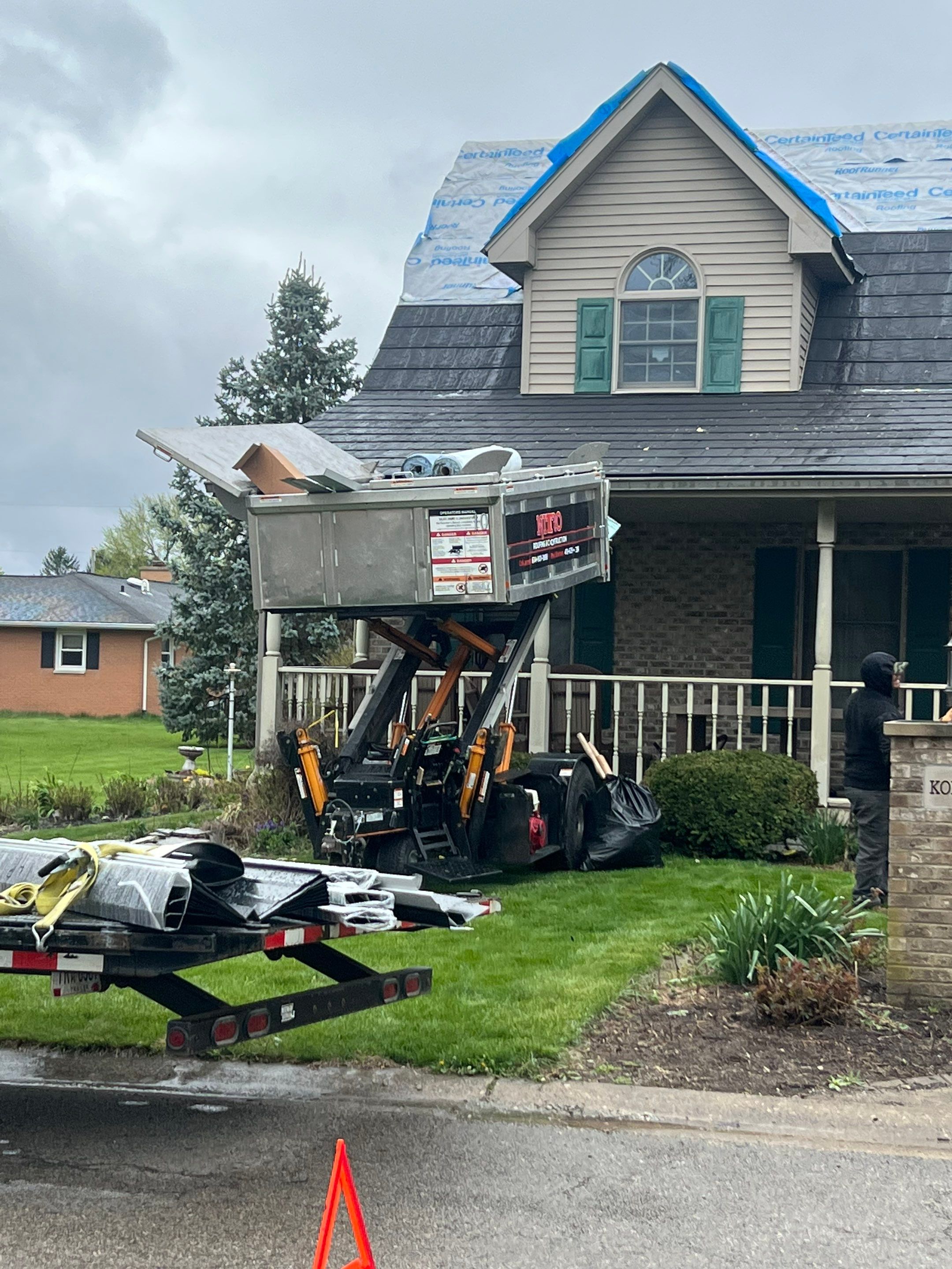 Residential Roofing Repair using Metstar Stone Coated Charcoal by Nitro Roofing and Construction