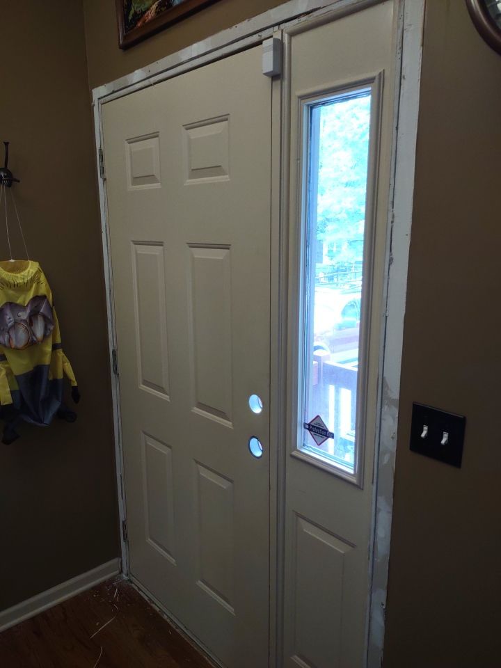 Siding Installation using Heartland Patio Door by EEC  Windows, Siding & Roofing 