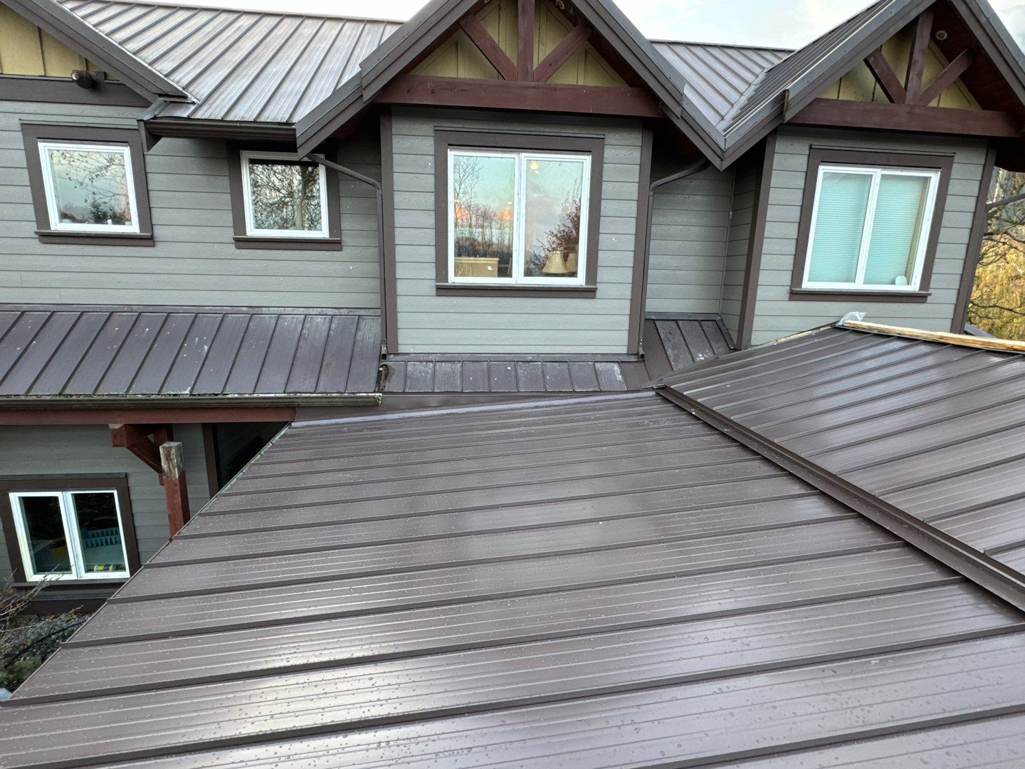 Residential Roofing Installation using 12" Prolok metal  by Top Notch Roofing Inc